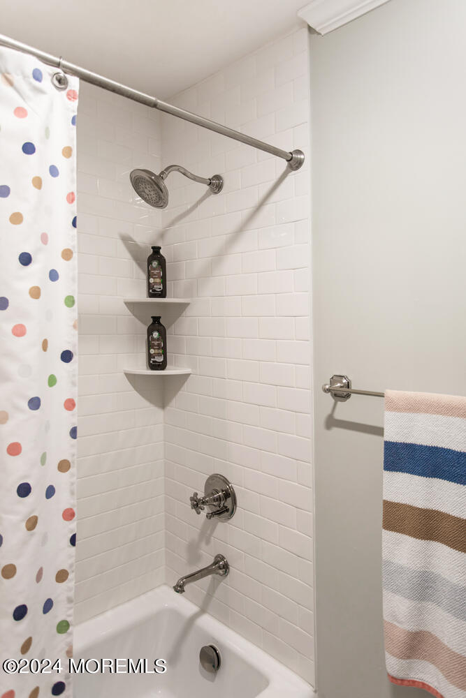 162 Twin Brooks Avenue Middletown, NJ 07748 - Photo 36 of 60 a bathroom with a shower