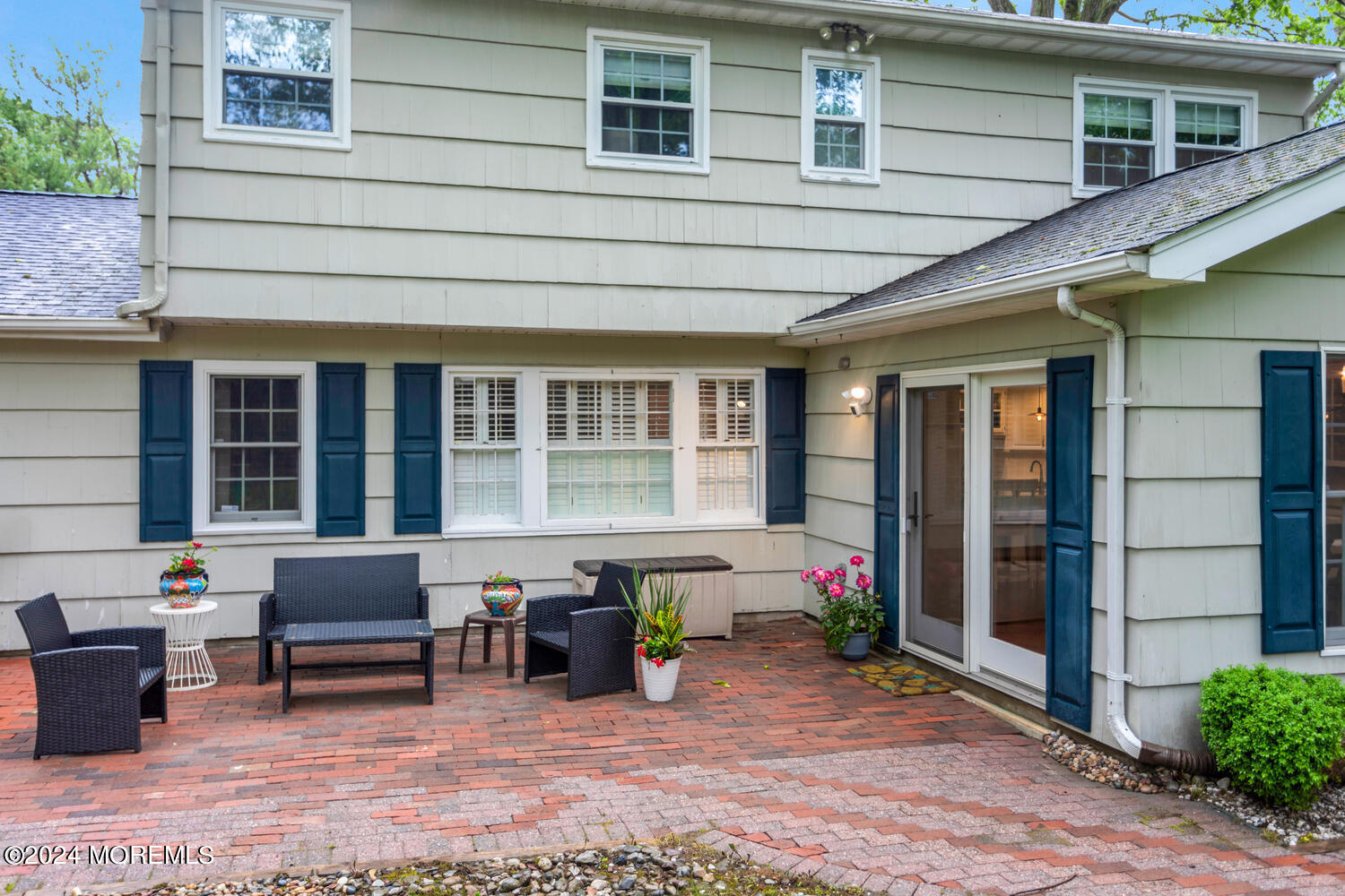 162 Twin Brooks Avenue Middletown, NJ 07748 - Photo 45 of 60 a front view of a house with outdoor seating