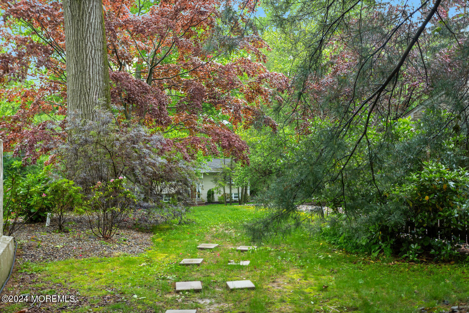 162 Twin Brooks Avenue Middletown, NJ 07748 - Photo 48 of 60 a backyard of a house with lots of green space