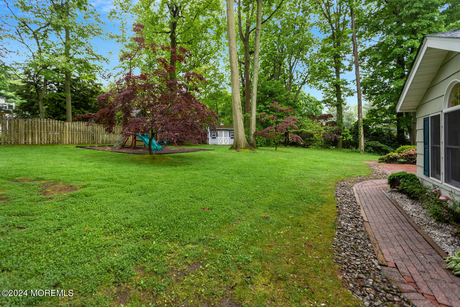162 Twin Brooks Avenue Middletown, NJ 07748 - Photo 53 of 60 a view of a backyard with large trees