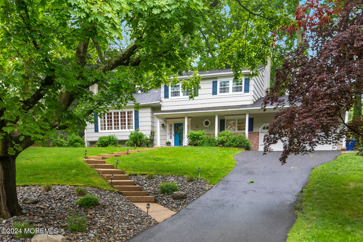 162 Twin Brooks Avenue Middletown, NJ 07748 - Photo 58 of 60 a front view of a house with yard and green space