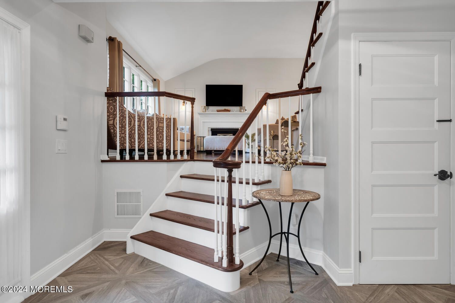 162 Twin Brooks Avenue Middletown, NJ 07748 - Photo 6 of 60 a view of entryway dining room and hall with wooden floor