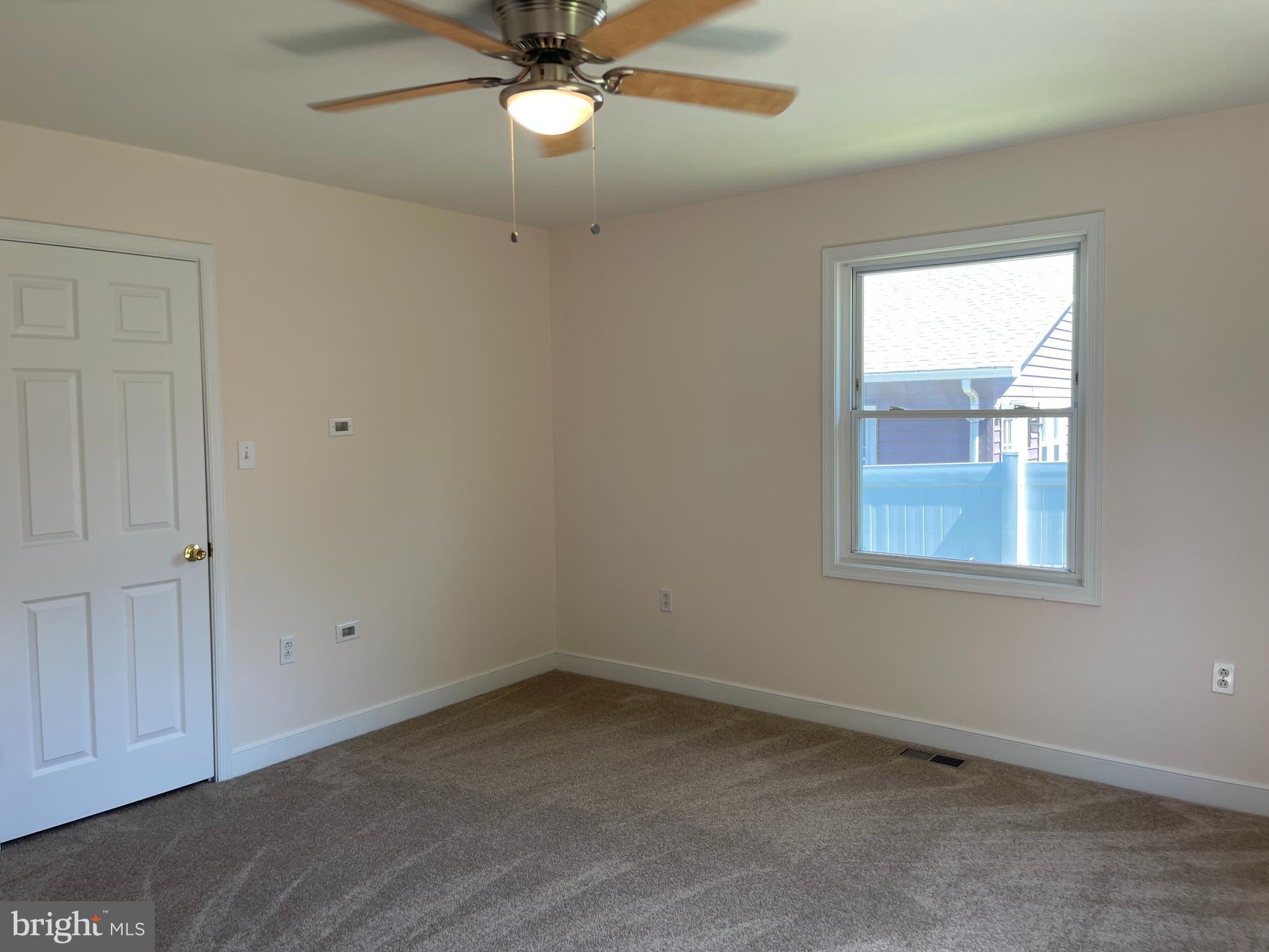 547 Compass Road East Middle River, MD 21220 - Photo 11 of 16 an empty room with a window