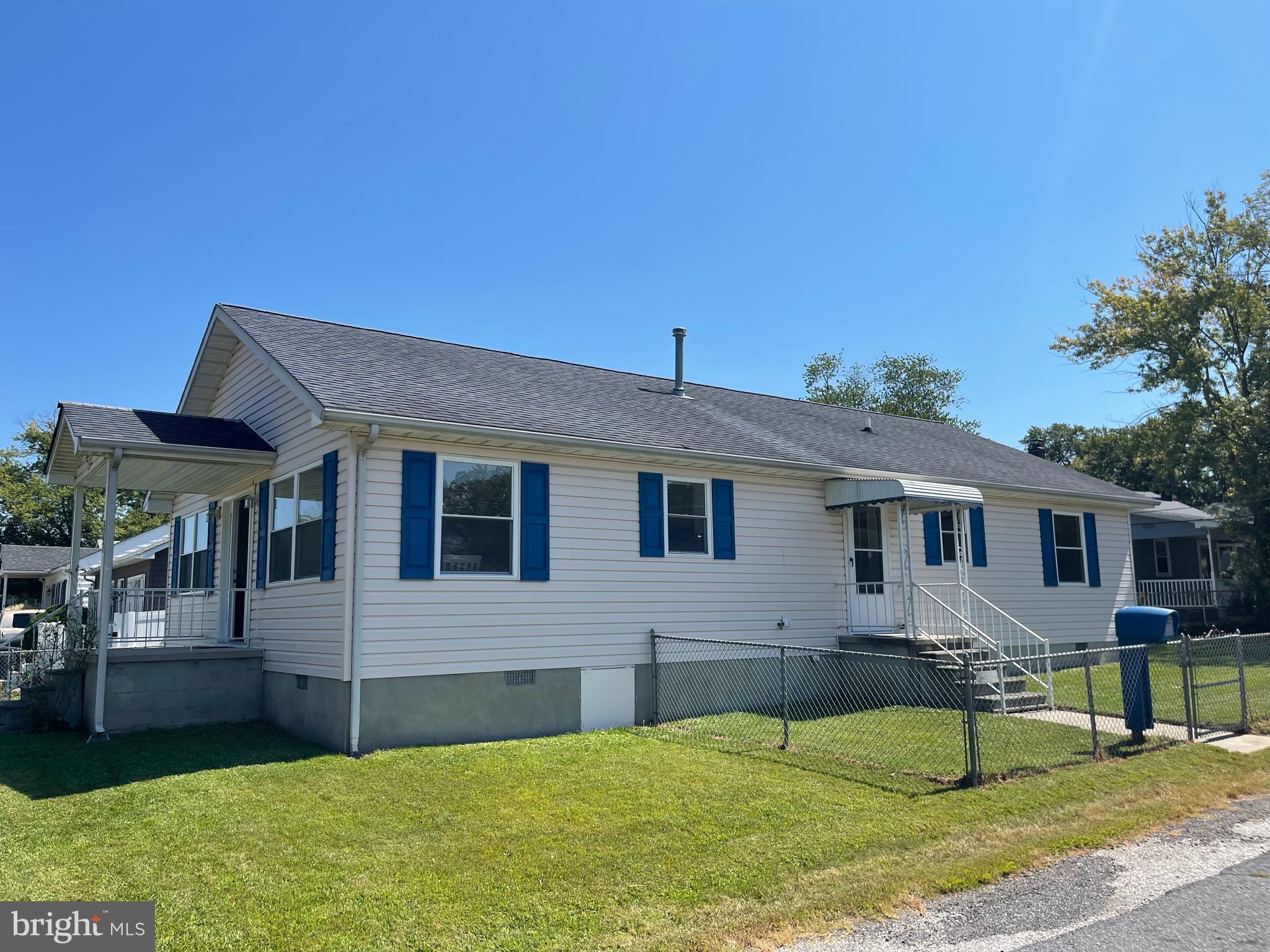 547 Compass Road East Middle River, MD 21220 - Photo 14 of 16 a front view of house with yard