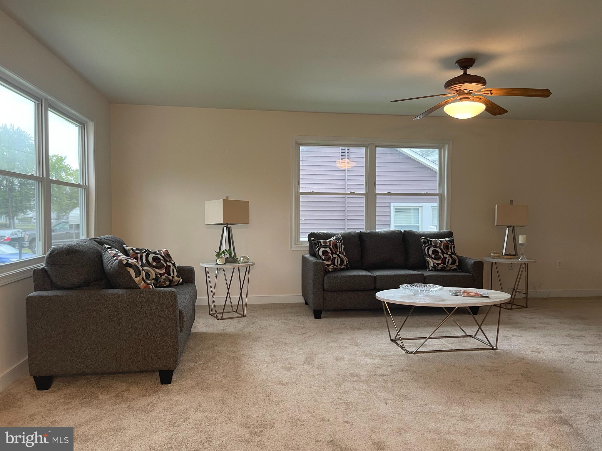 547 Compass Road East Middle River, MD 21220 - Photo 4 of 16 a living room with furniture and a large window