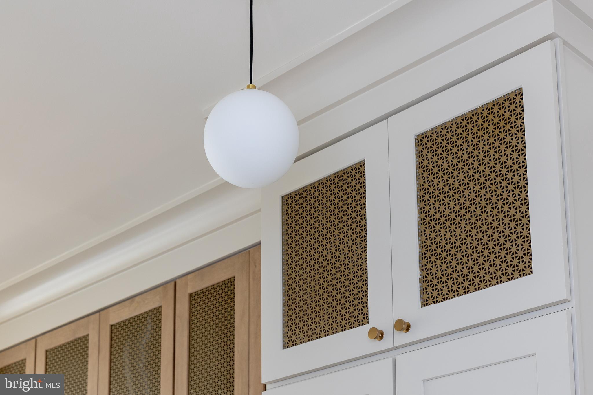 441 Q Street Northwest, Unit PH Washington, DC 20001 - Photo 12 of 55 a view of a hallway with wooden floor and a chandelier