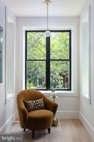 a bedroom with bed and a window