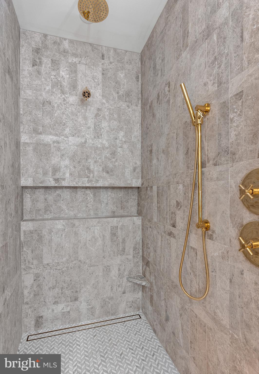 441 Q Street Northwest, Unit PH Washington, DC 20001 - Photo 30 of 55 a bathroom with a bath tub