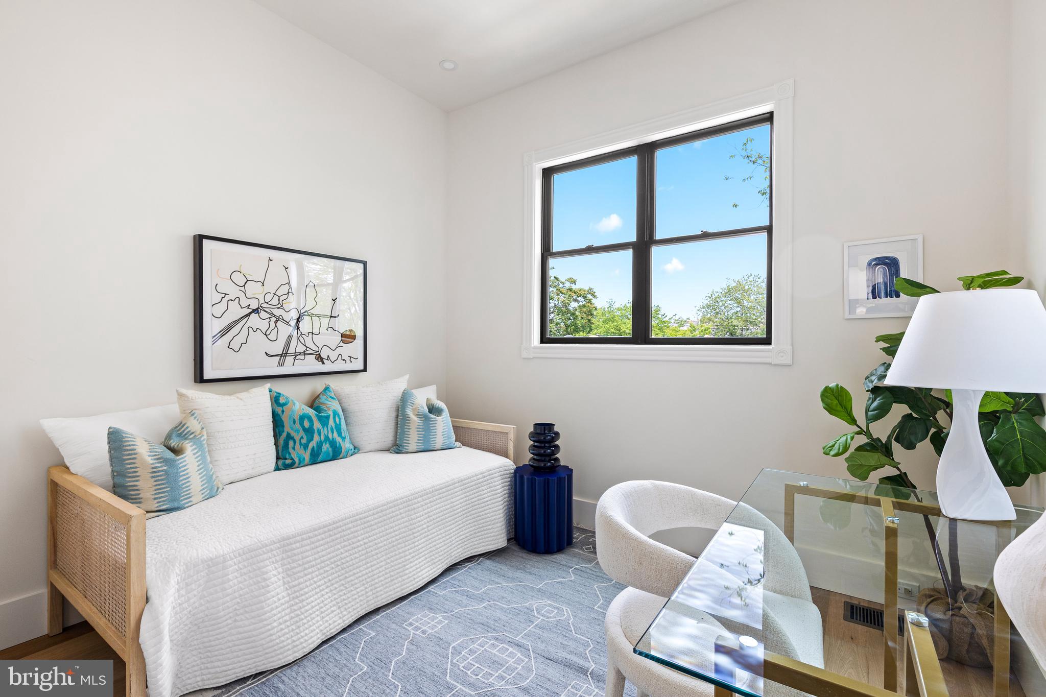 441 Q Street Northwest, Unit PH Washington, DC 20001 - Photo 35 of 55 a living room with furniture and a window