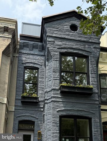 a view of chairs and table on the terrace