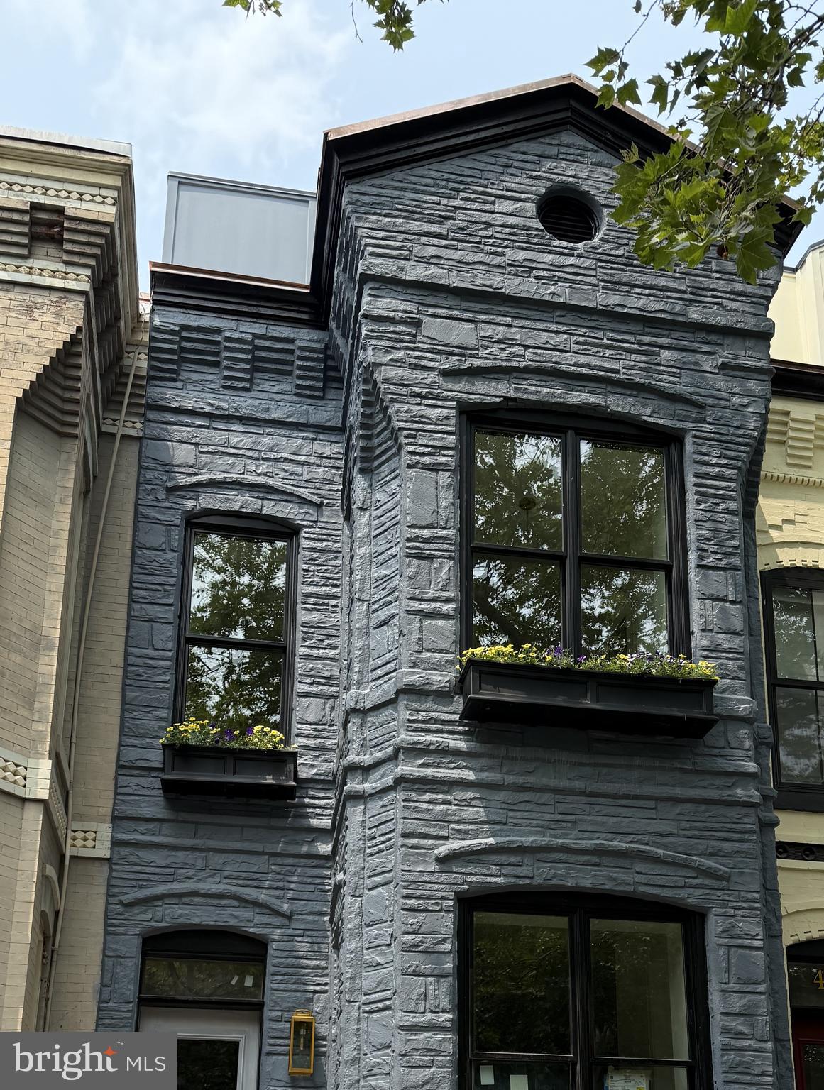 441 Q Street Northwest, Unit PH Washington, DC 20001 - Photo 43 of 55 a stove top oven sitting inside of a kitchen