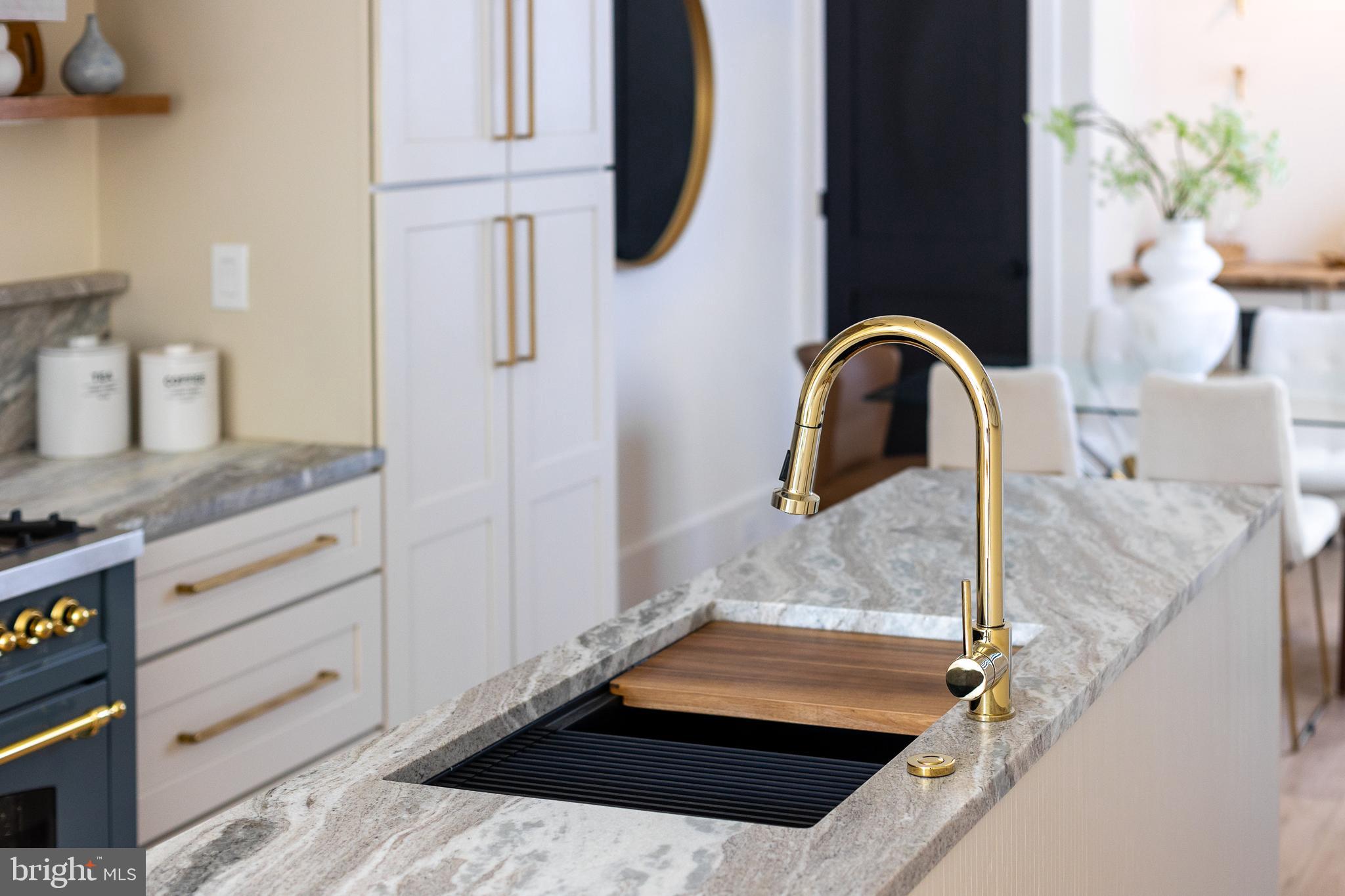 441 Q Street Northwest, Unit PH Washington, DC 20001 - Photo 5 of 55 a close view of sink and tap