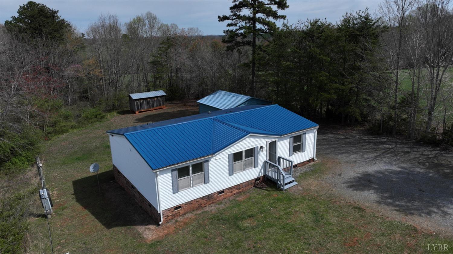 3961 Roark Mill Road Hurt, VA 24563 - Photo 1 of 28 a aerial view of a house with a yard