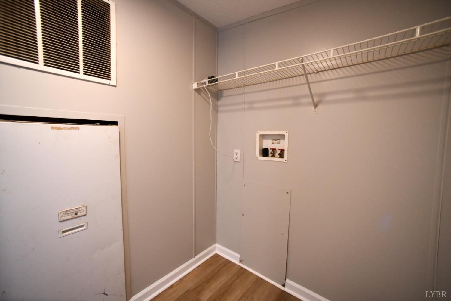 3961 Roark Mill Road Hurt, VA 24563 - Photo 16 of 28 a bathroom with a shower and sink