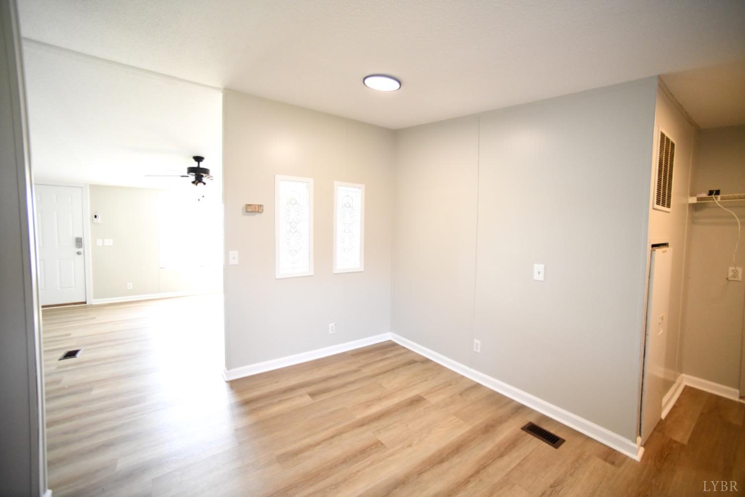 3961 Roark Mill Road Hurt, VA 24563 - Photo 17 of 28 wooden floor in an empty room
