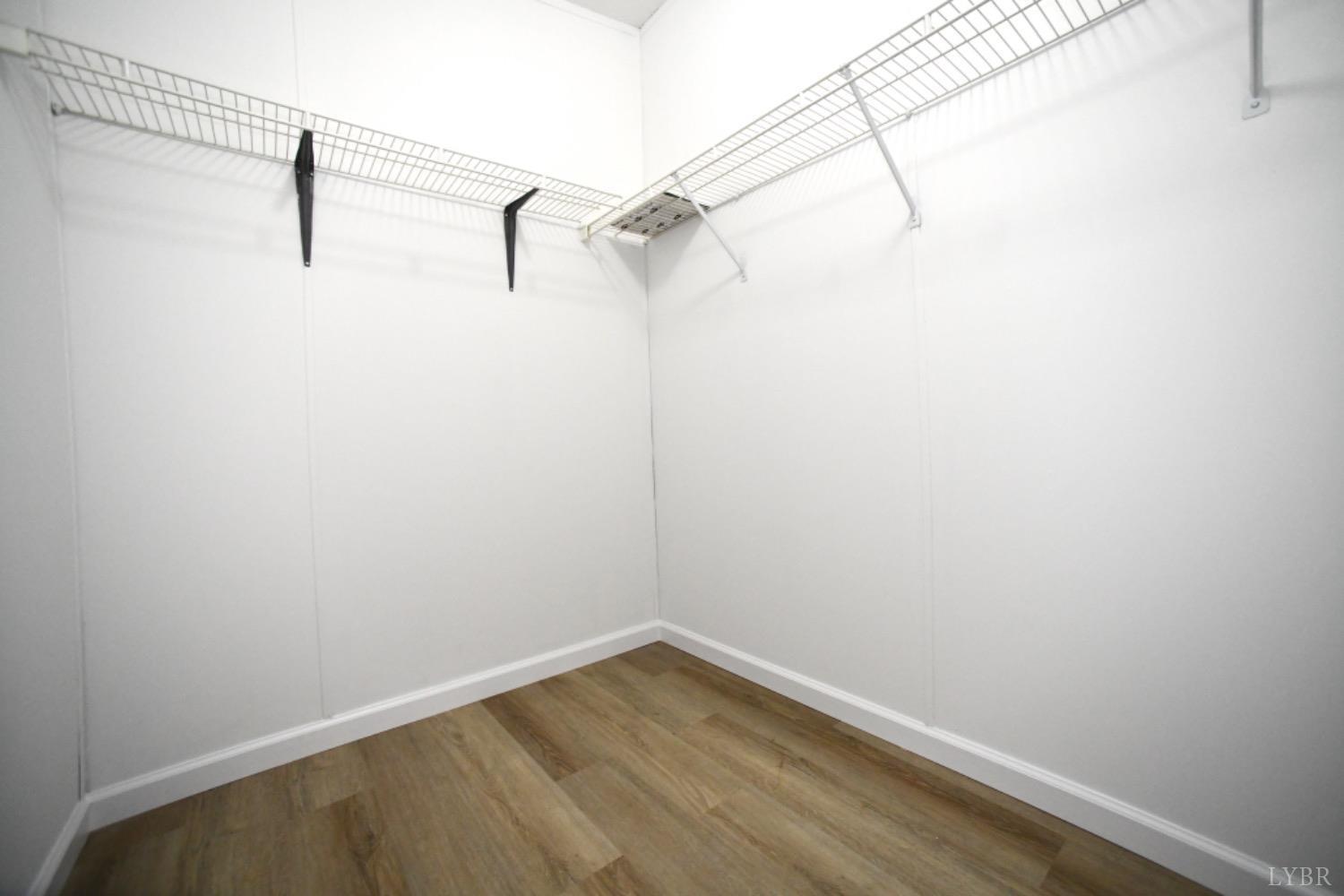 3961 Roark Mill Road Hurt, VA 24563 - Photo 21 of 28 a view of a room with racks on the wall