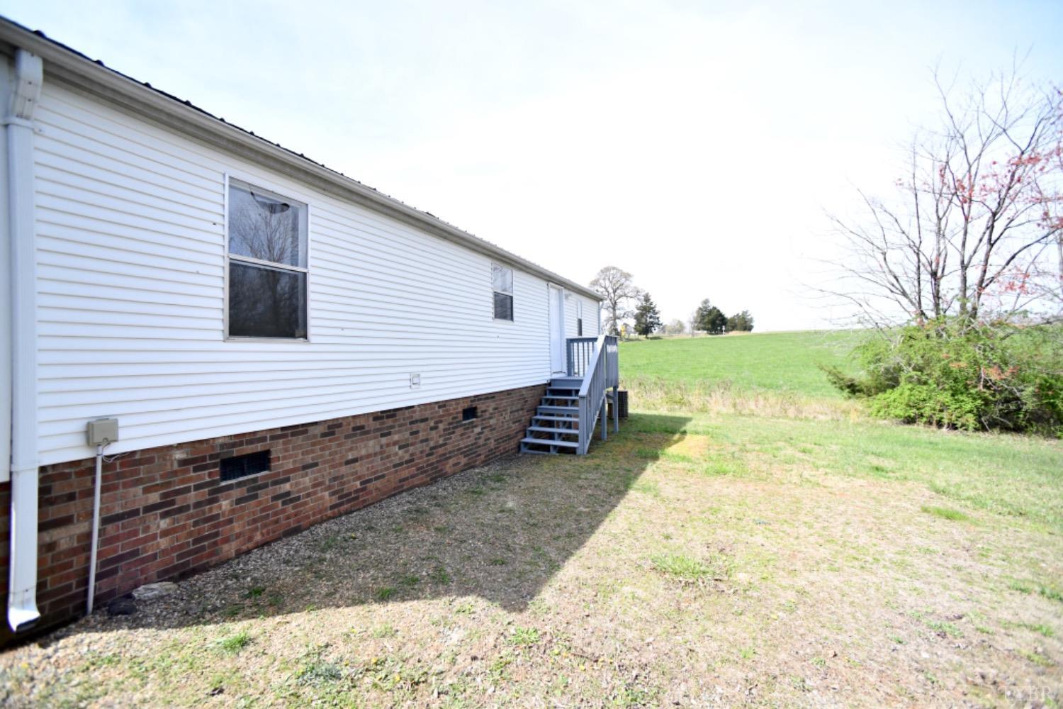 3961 Roark Mill Road Hurt, VA 24563 - Photo 26 of 28 a view of a back yard of the house