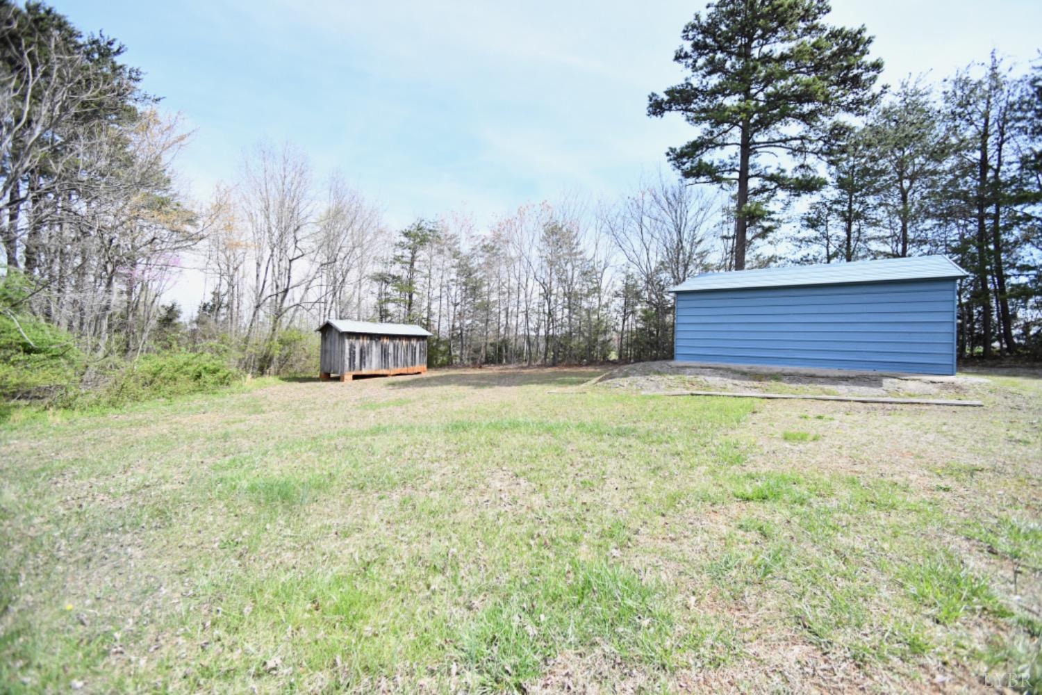 3961 Roark Mill Road Hurt, VA 24563 - Photo 27 of 28 a view of garden with tree in the background