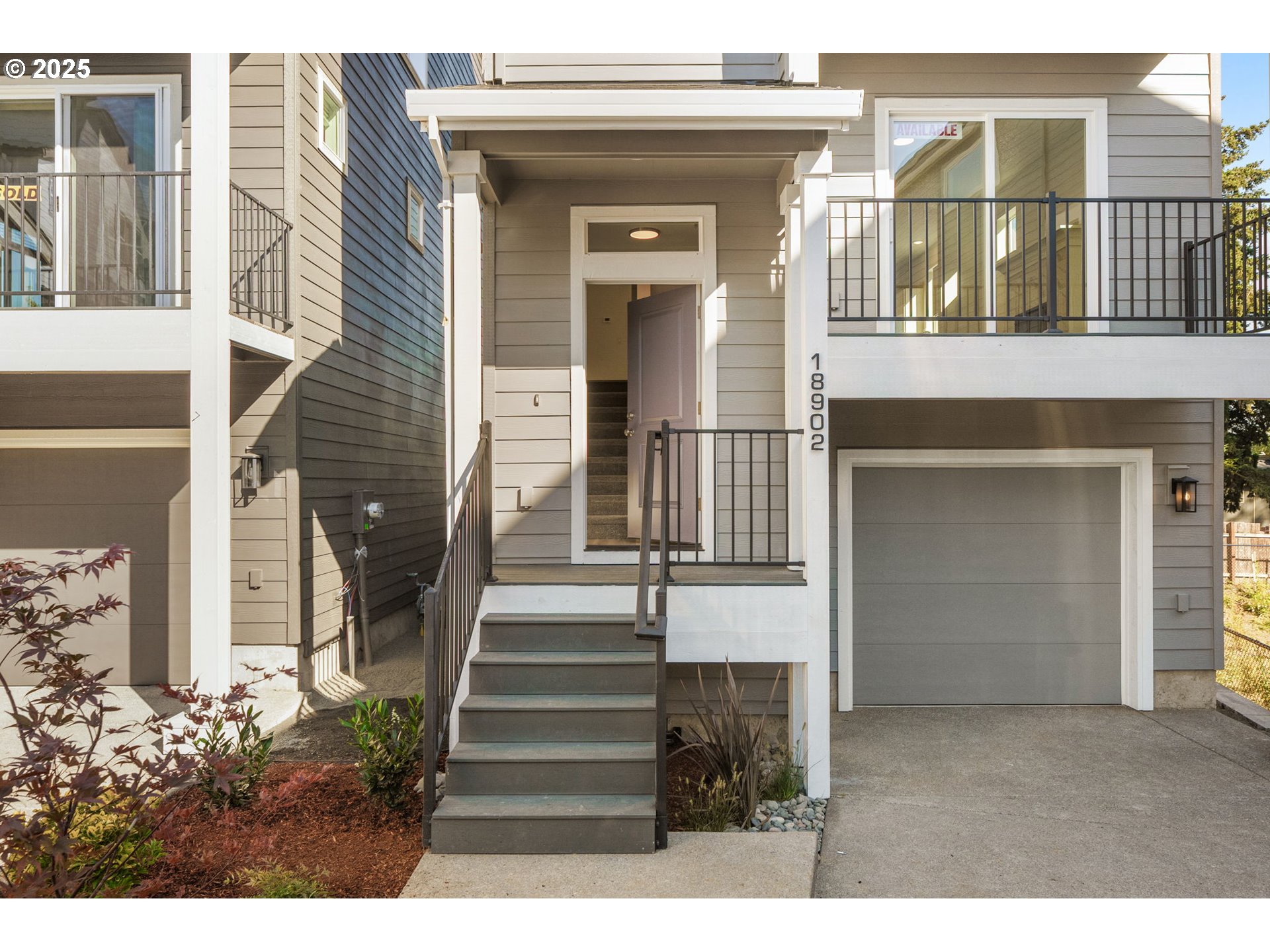 18933 Southwest Hazelwood Lane, Unit L9 Beaverton, OR 97078 - Photo 2 of 29 front view of a house