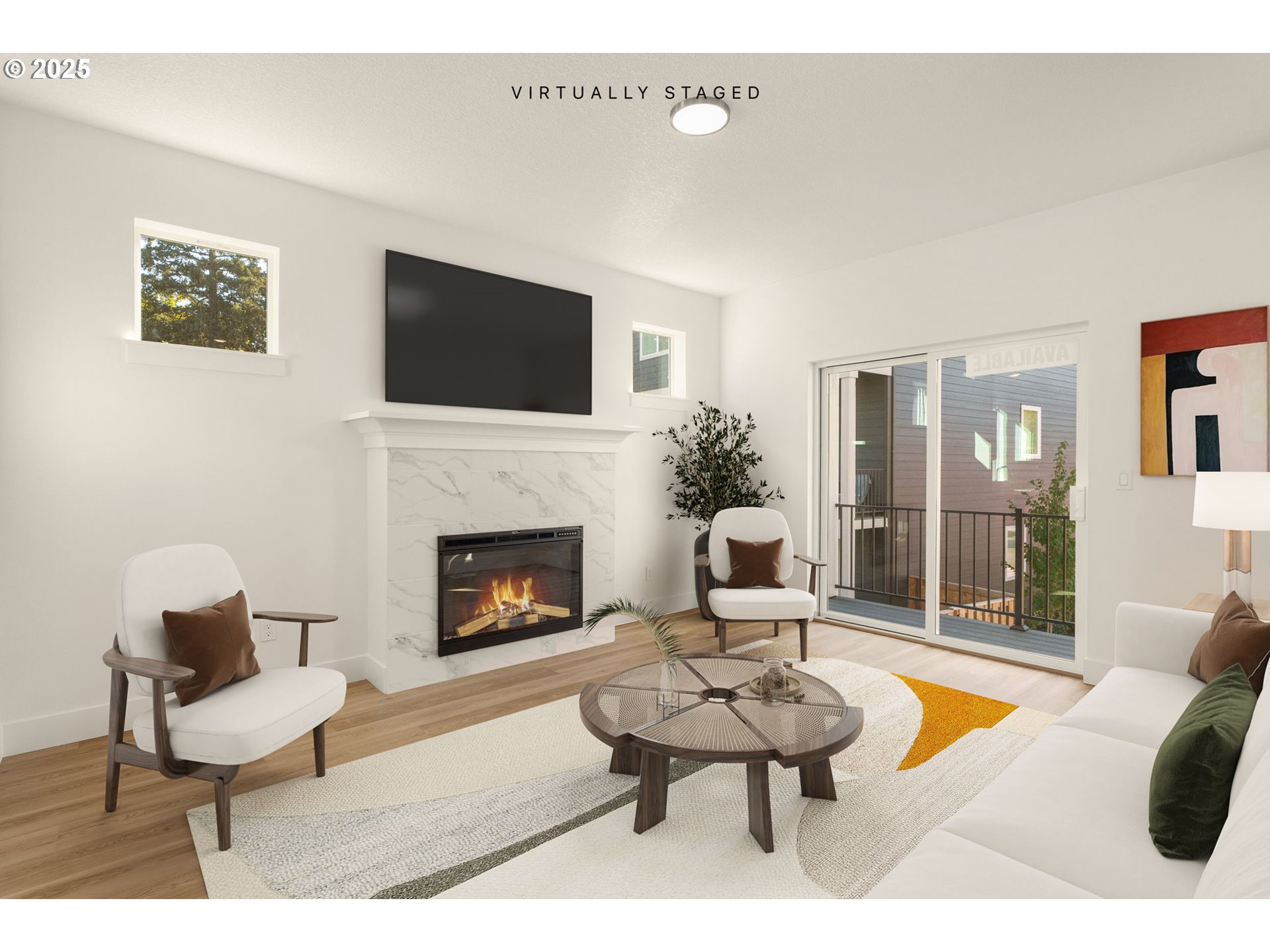 18933 Southwest Hazelwood Lane, Unit L9 Beaverton, OR 97078 - Photo 3 of 29 a living room with furniture a flat screen tv and a fireplace