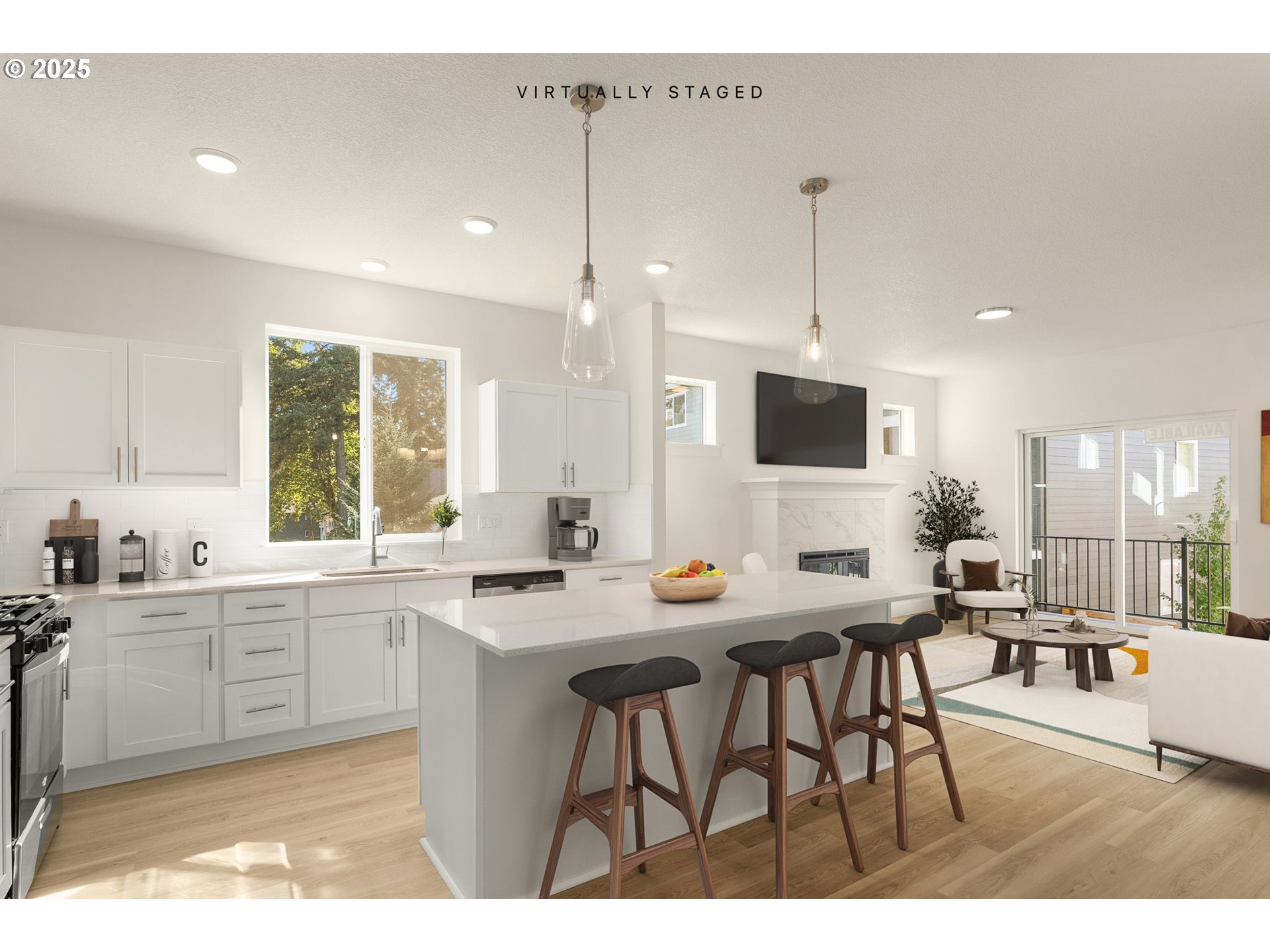 18933 Southwest Hazelwood Lane, Unit L9 Beaverton, OR 97078 - Photo 5 of 29 a kitchen with stainless steel appliances kitchen island granite countertop a sink a stove a dining table and chairs