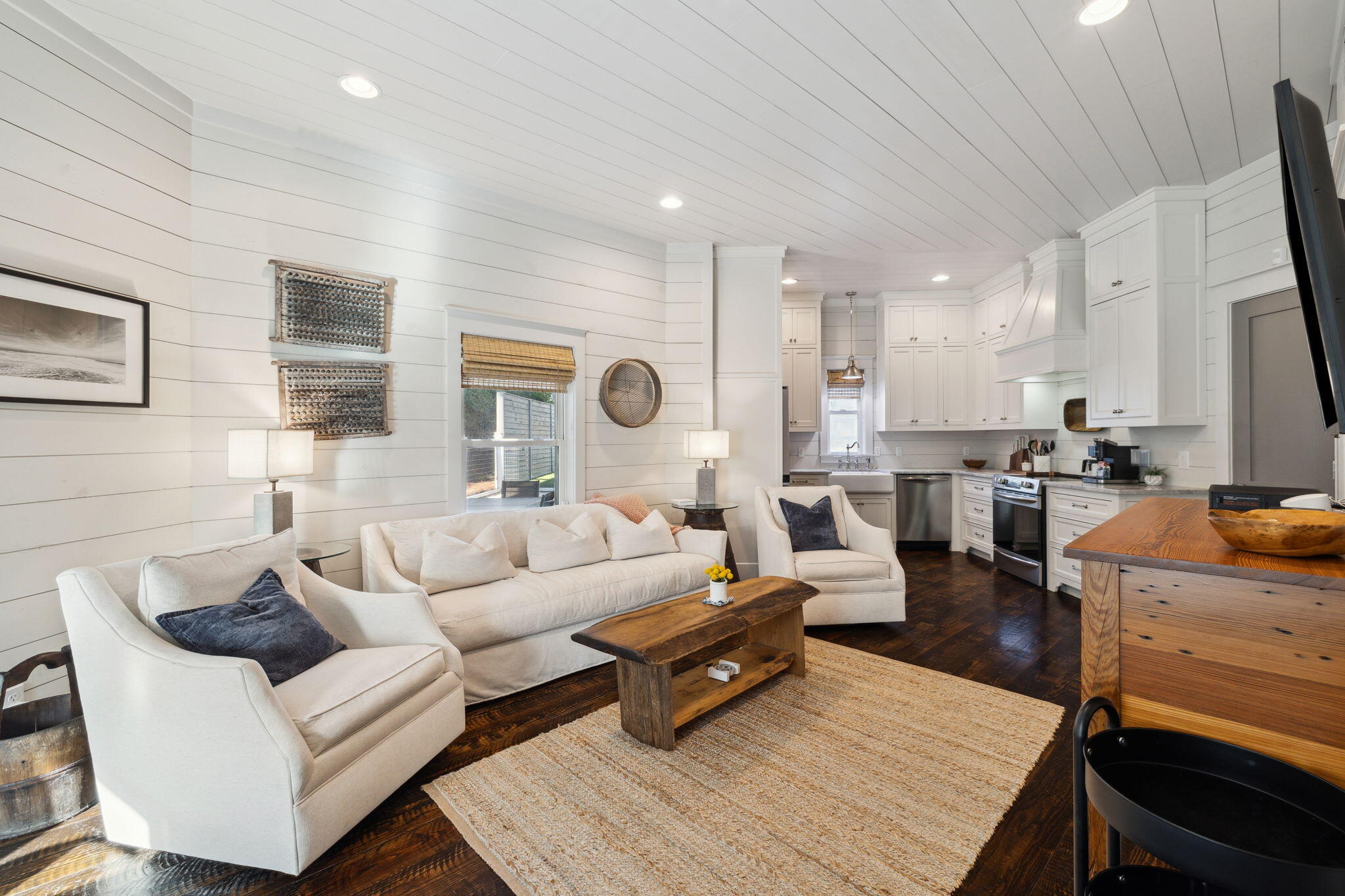 59 Montigo Avenue Santa Rosa Beach, FL 32459 - Photo 14 of 48 a living room with furniture and a flat screen tv