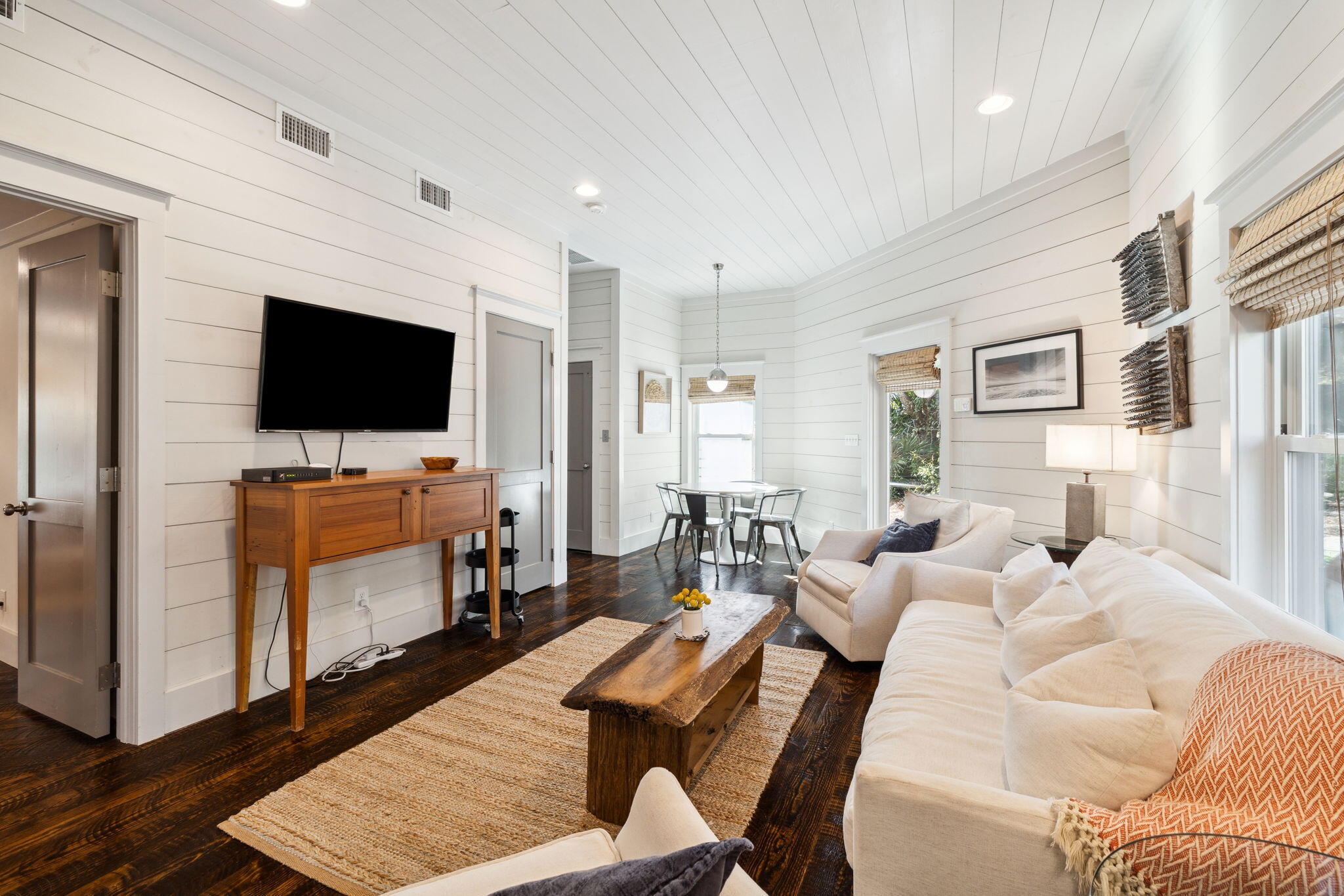 59 Montigo Avenue Santa Rosa Beach, FL 32459 - Photo 15 of 48 a living room with furniture and a flat screen tv