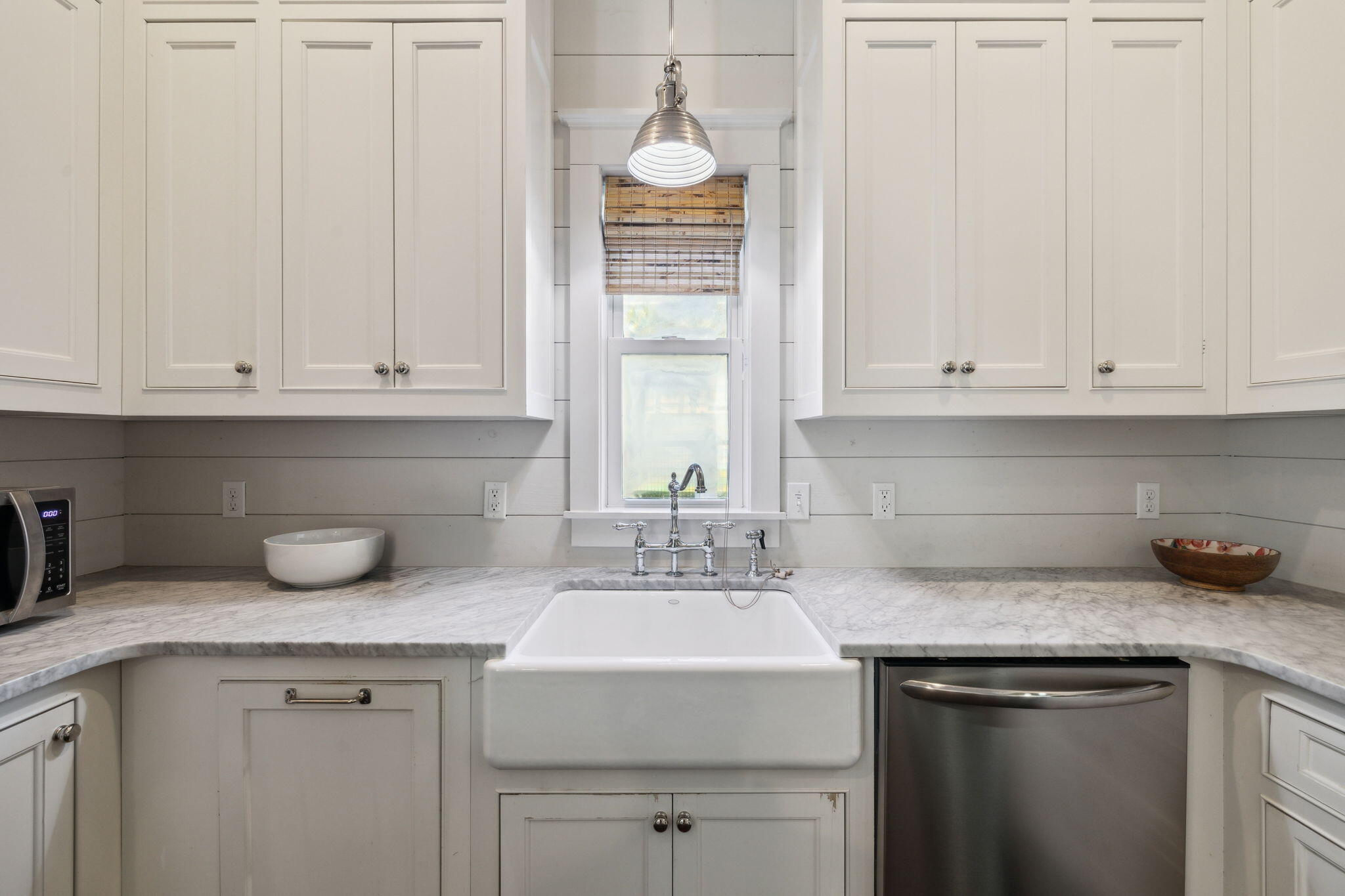 59 Montigo Avenue Santa Rosa Beach, FL 32459 - Photo 20 of 48 a kitchen with granite countertop white cabinets and a sink