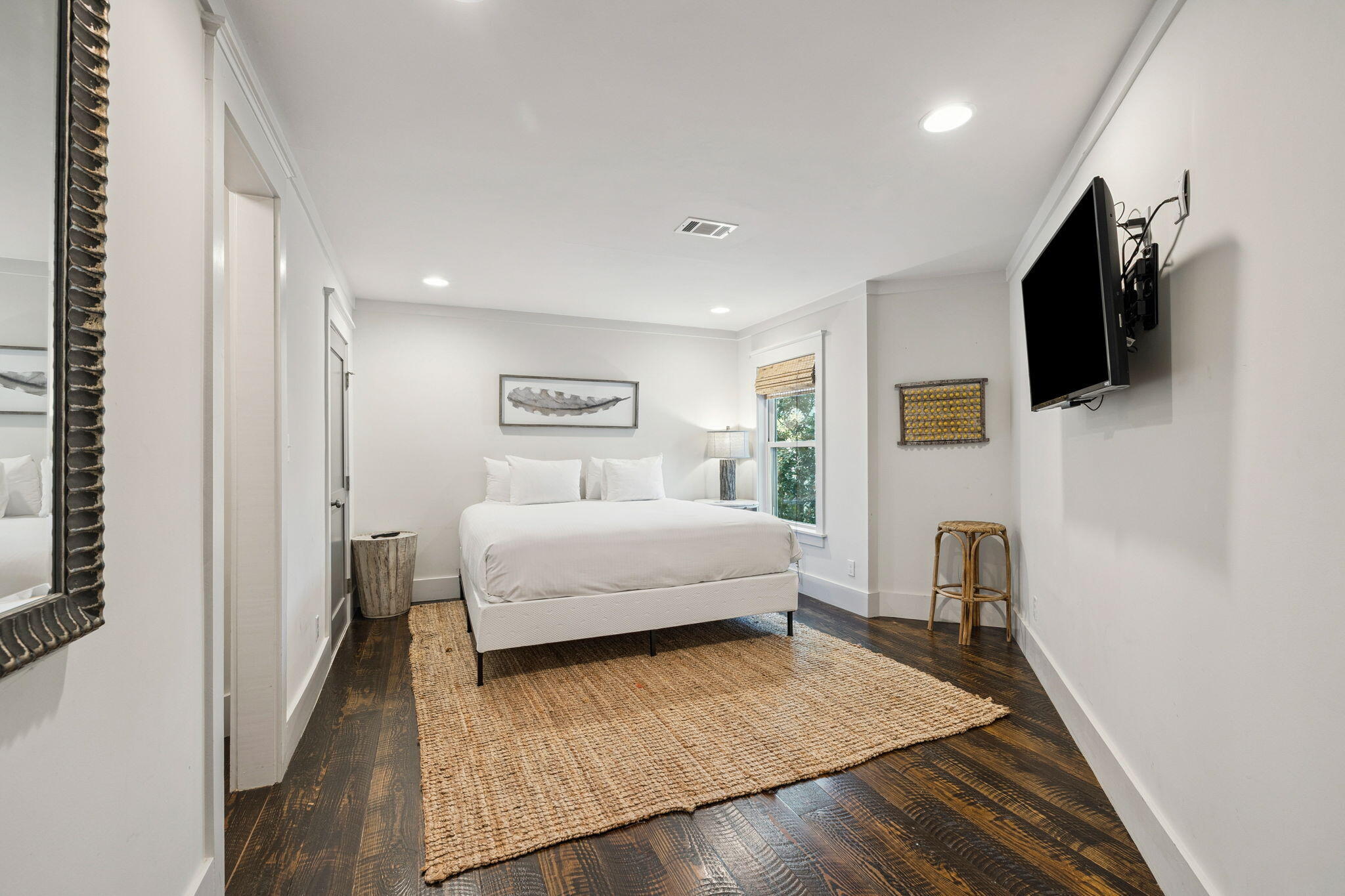 59 Montigo Avenue Santa Rosa Beach, FL 32459 - Photo 24 of 48 a bedroom with a bed a flat screen tv and dresser