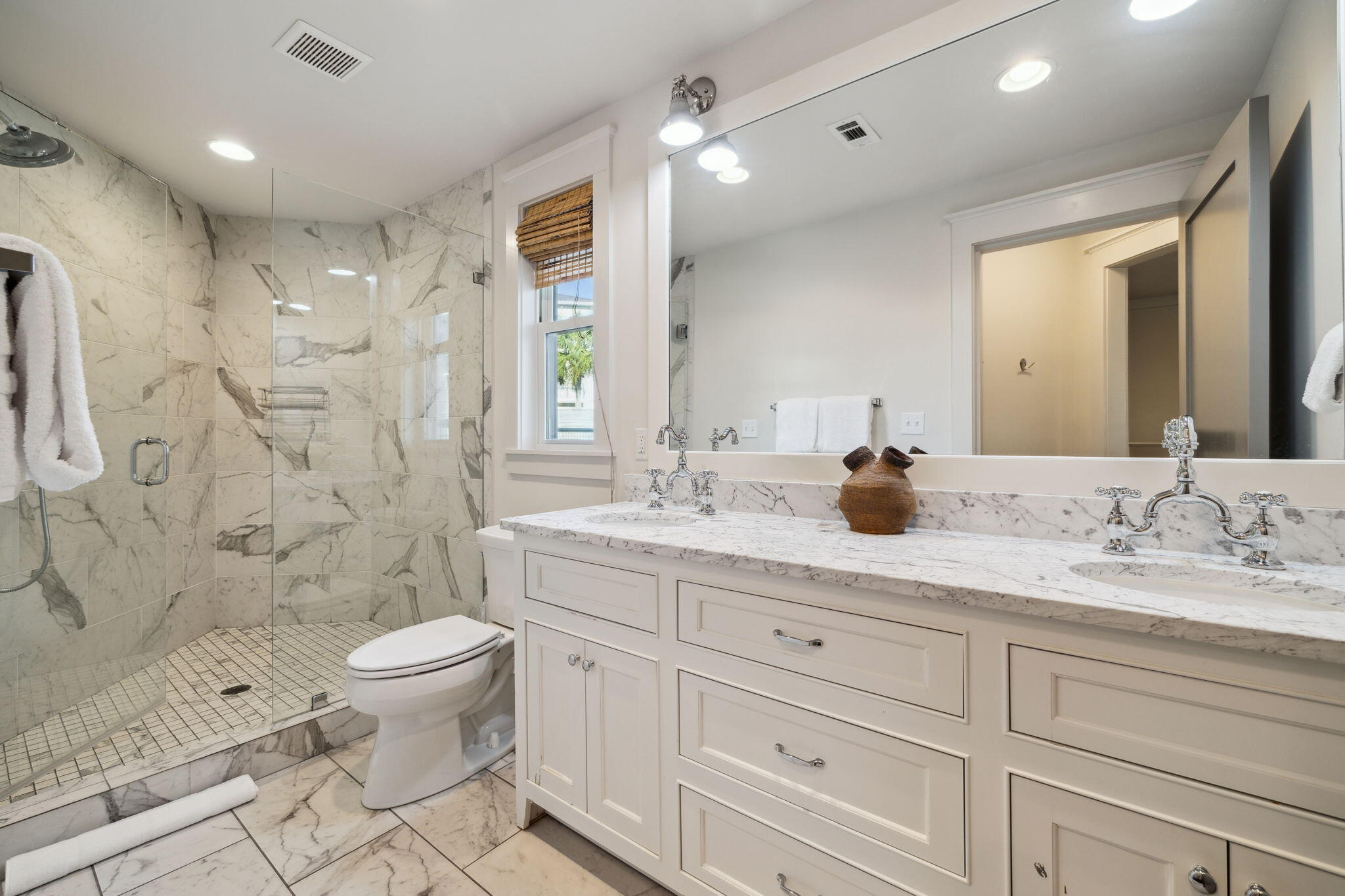 59 Montigo Avenue Santa Rosa Beach, FL 32459 - Photo 26 of 48 a bathroom with a granite countertop sink toilet a large mirror a shower and vanity