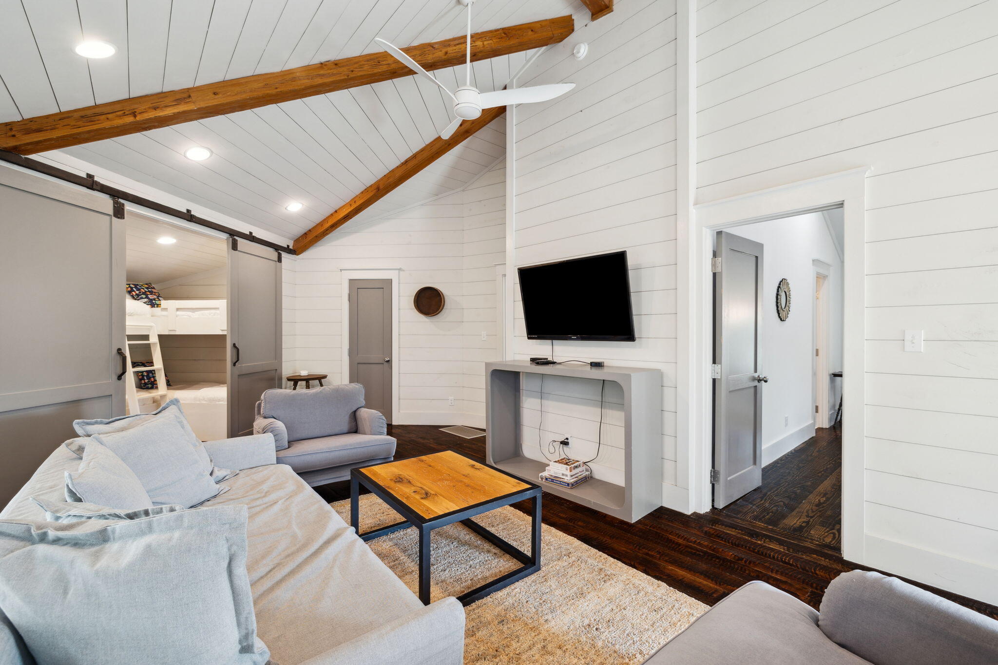 59 Montigo Avenue Santa Rosa Beach, FL 32459 - Photo 27 of 48 a living room with furniture and a flat screen tv