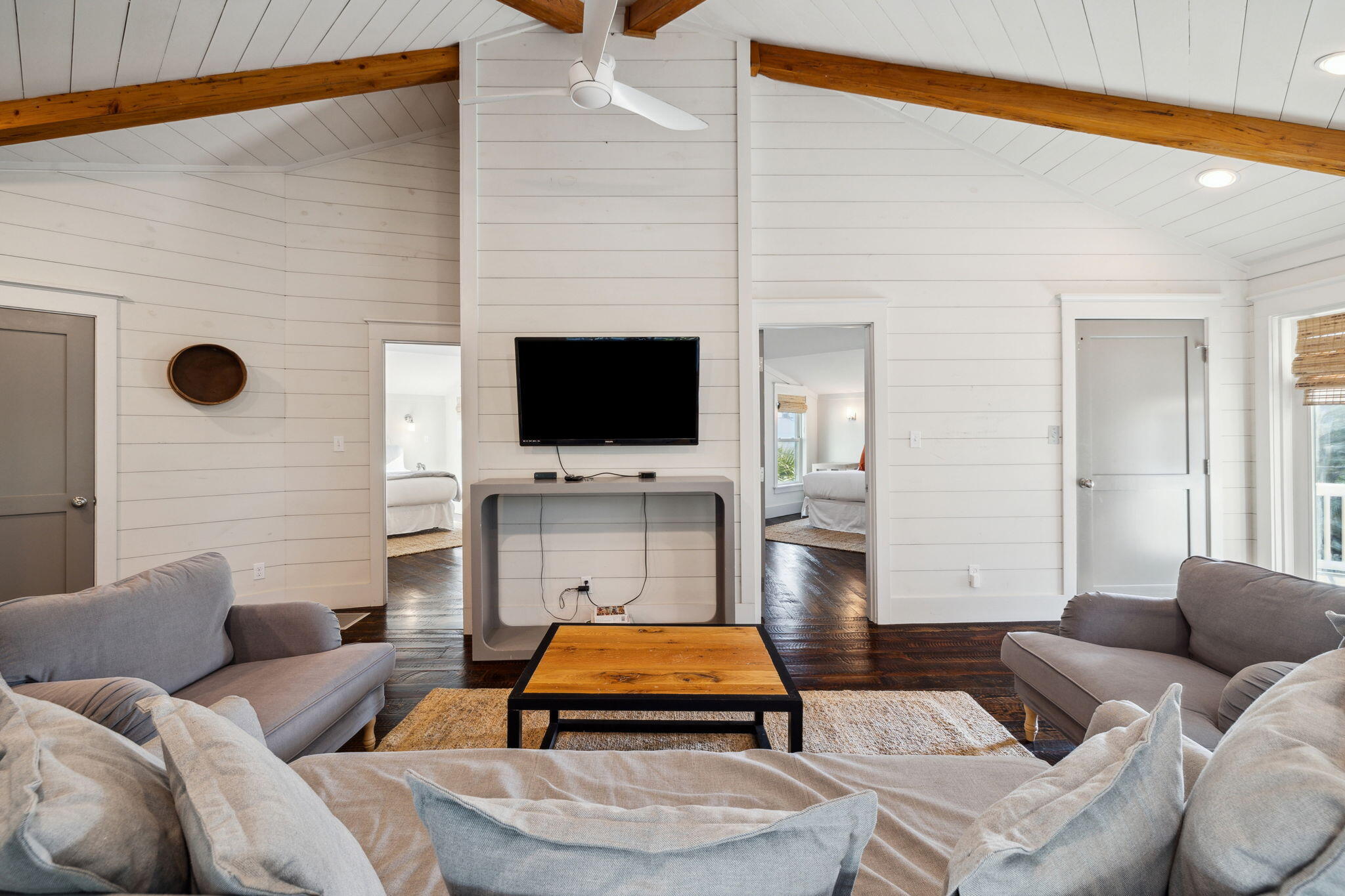 59 Montigo Avenue Santa Rosa Beach, FL 32459 - Photo 28 of 48 a living room with furniture and a flat screen tv