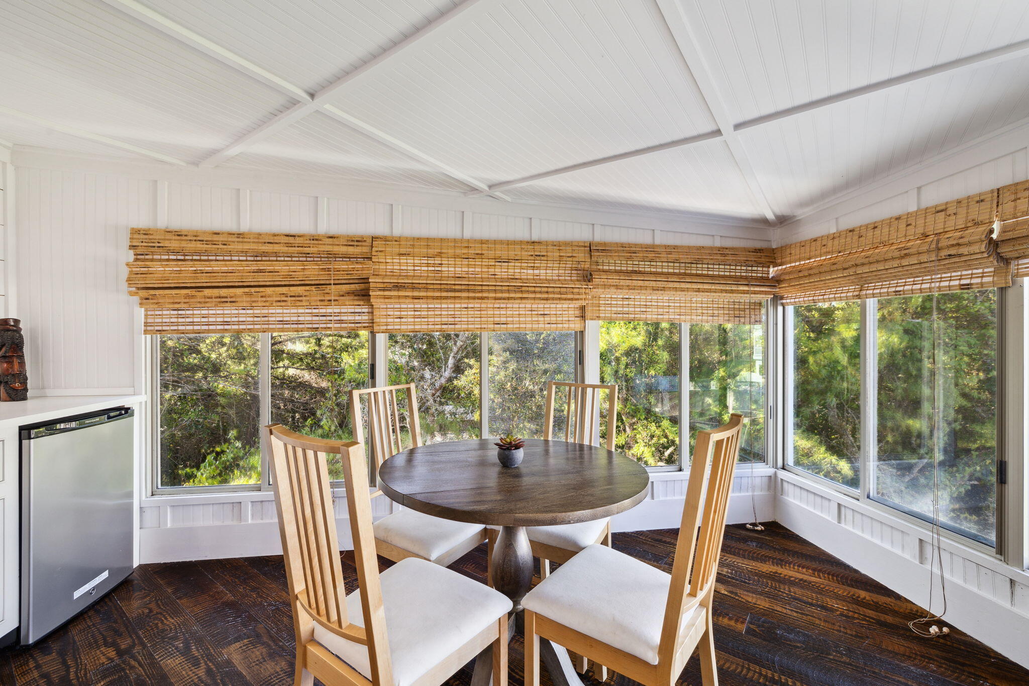 59 Montigo Avenue Santa Rosa Beach, FL 32459 - Photo 30 of 48 a view of a dining room with furniture wooden floor and a potted plant