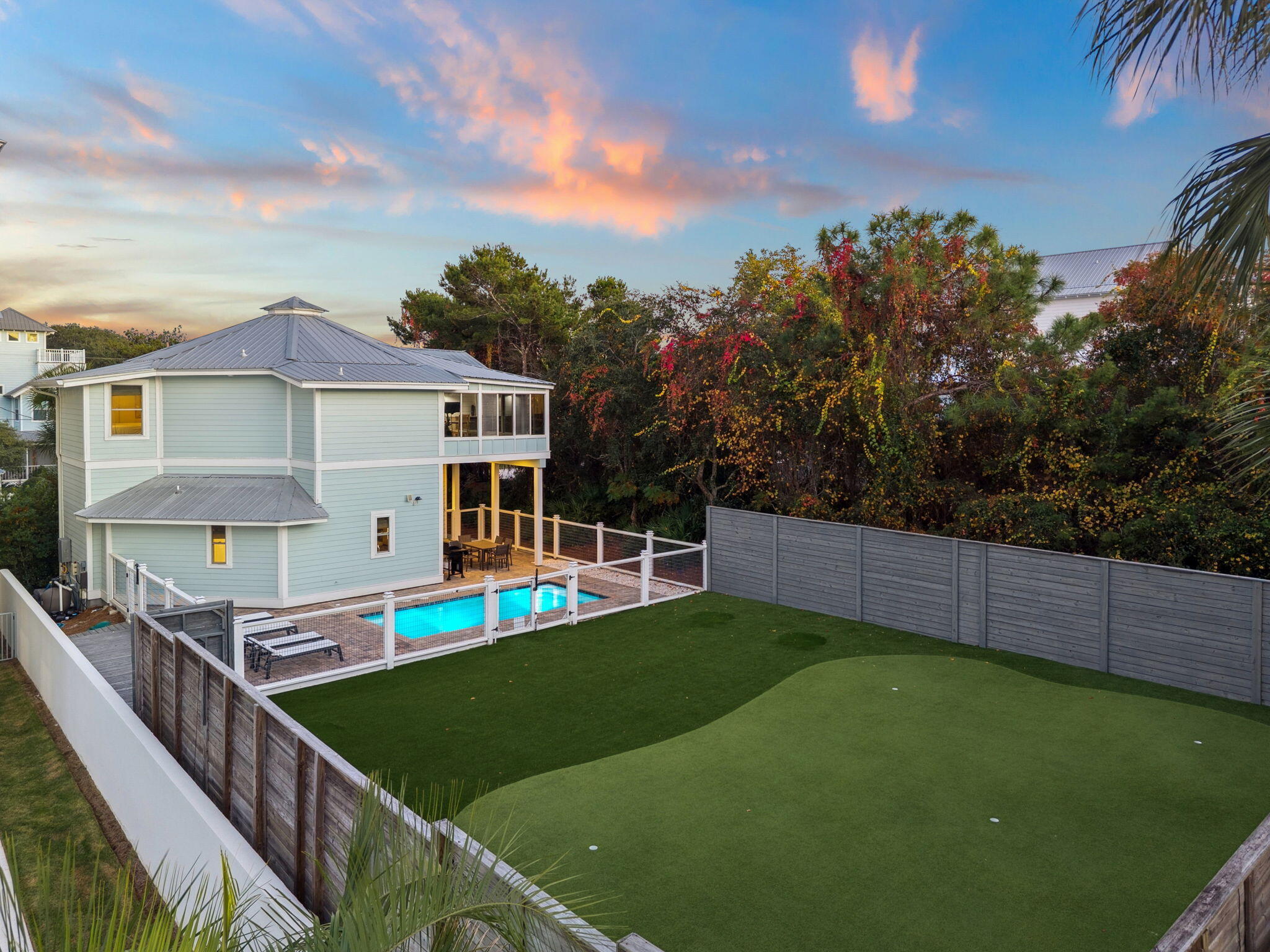 59 Montigo Avenue Santa Rosa Beach, FL 32459 - Photo 4 of 48 a view of a house with pool and a yard