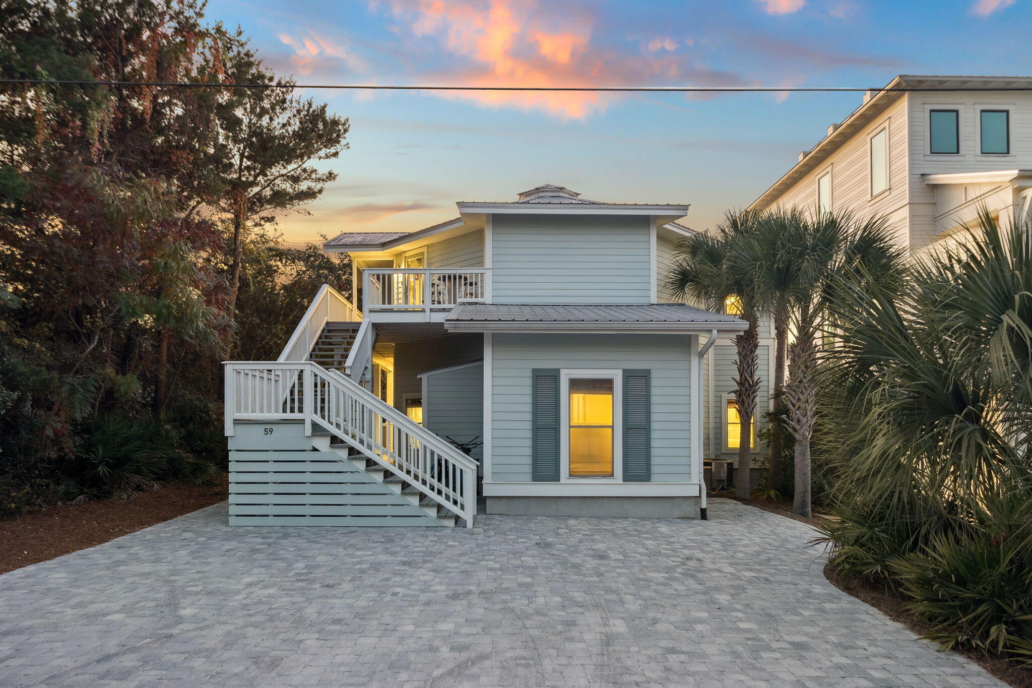 59 Montigo Avenue Santa Rosa Beach, FL 32459 - Photo 8 of 48 a view of a house with a yard and potted plants