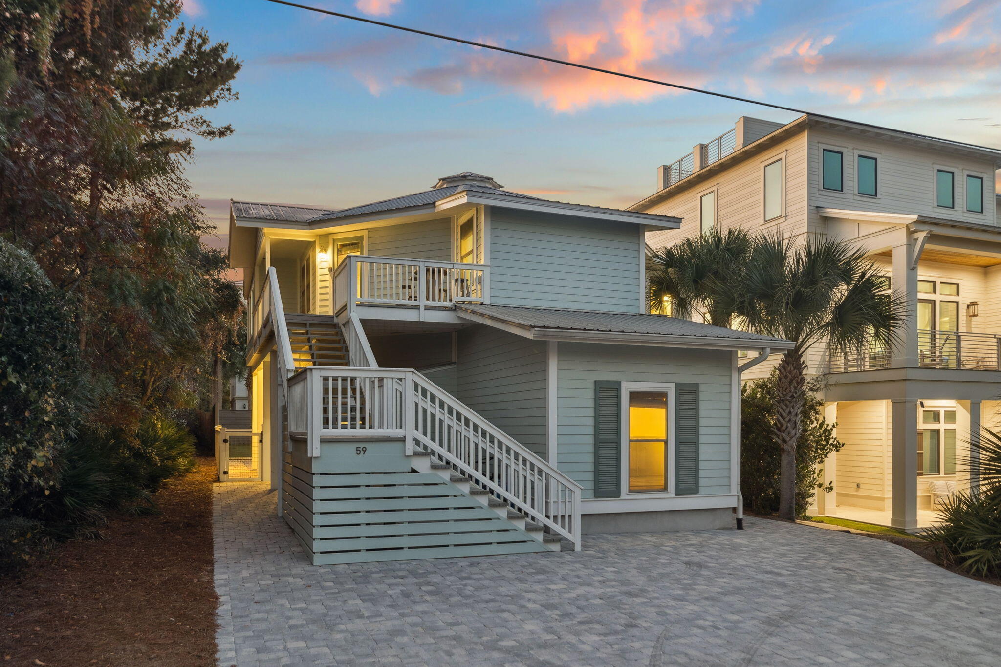59 Montigo Avenue Santa Rosa Beach, FL 32459 - Photo 9 of 48 a front view of a house with a yard