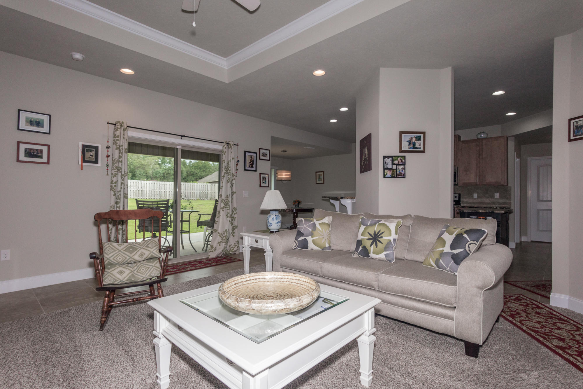 4675 Chanteuse Parkway Crestview, FL 32539 - Photo 11 of 35 a living room with furniture and a table