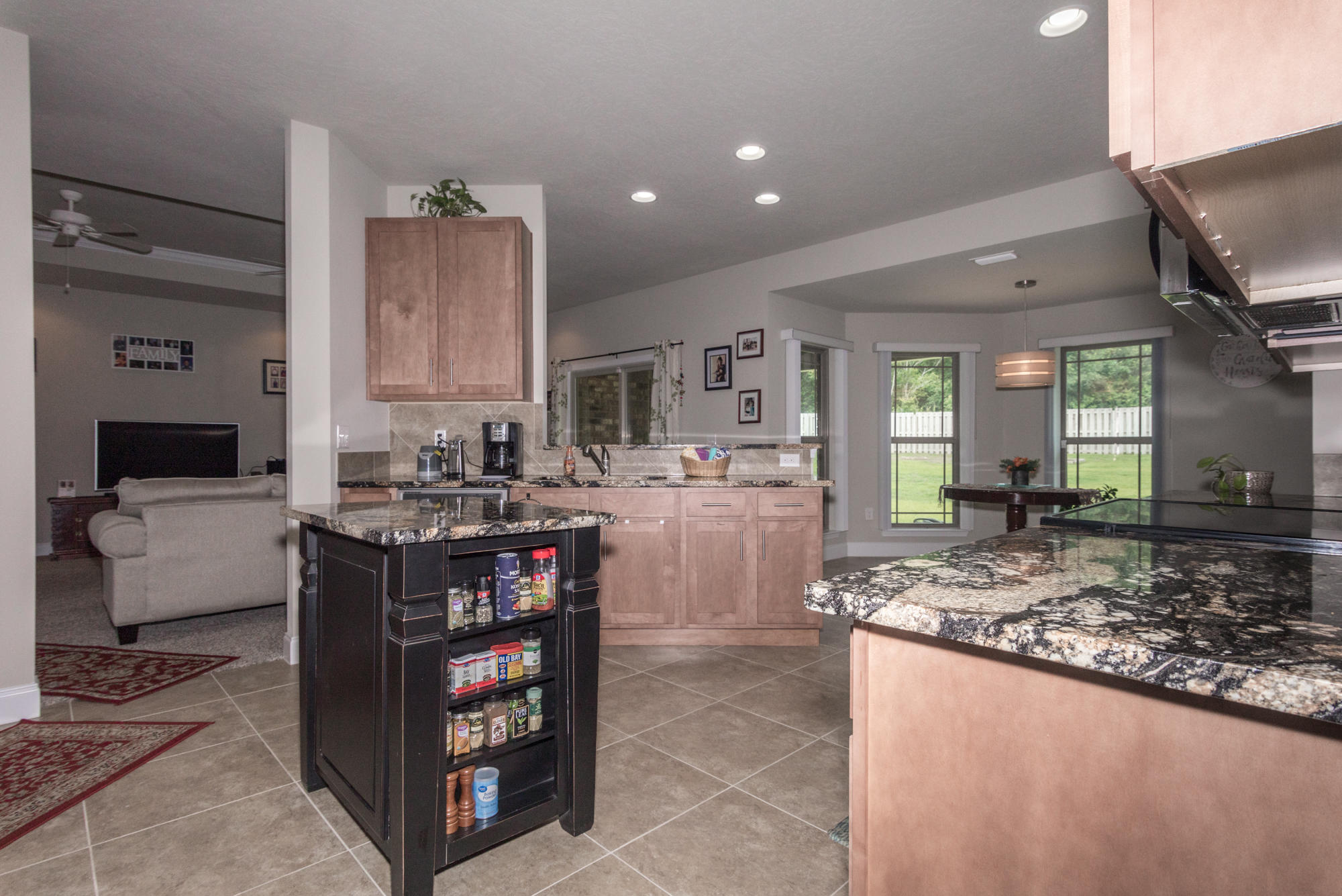 4675 Chanteuse Parkway Crestview, FL 32539 - Photo 13 of 35 a kitchen with stainless steel appliances granite countertop a stove and a sink