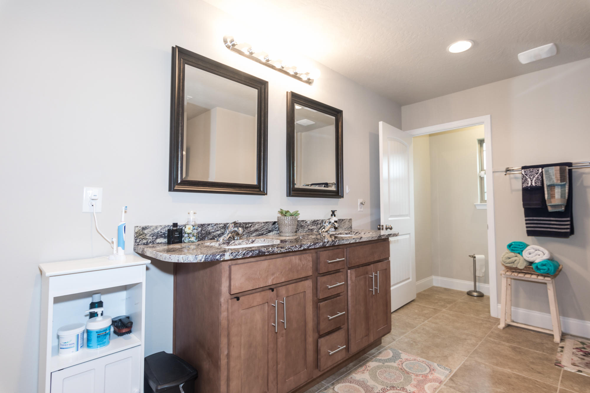 4675 Chanteuse Parkway Crestview, FL 32539 - Photo 21 of 35 a bathroom with a sink and a mirror