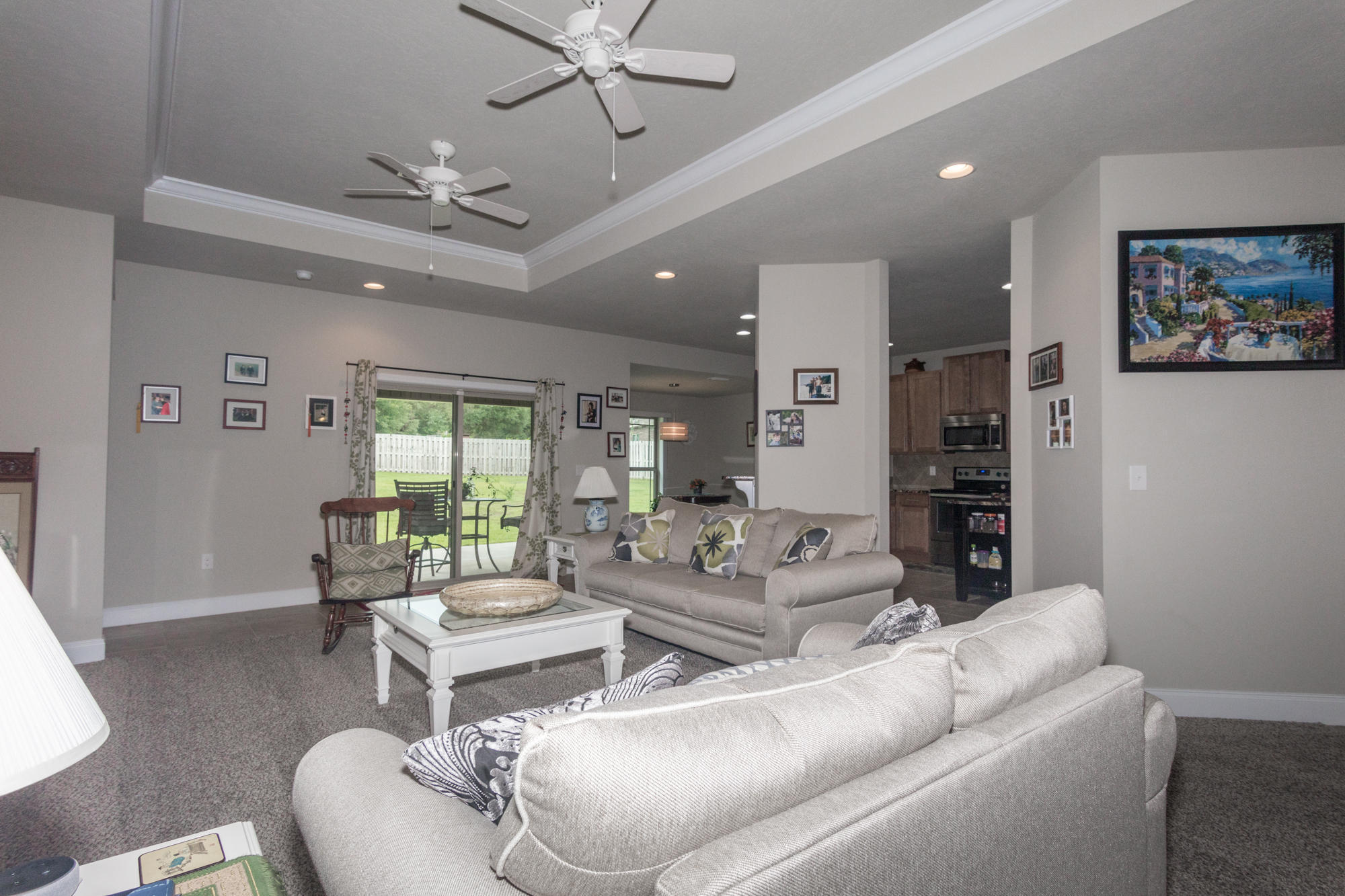4675 Chanteuse Parkway Crestview, FL 32539 - Photo 9 of 35 a living room with furniture and a large window
