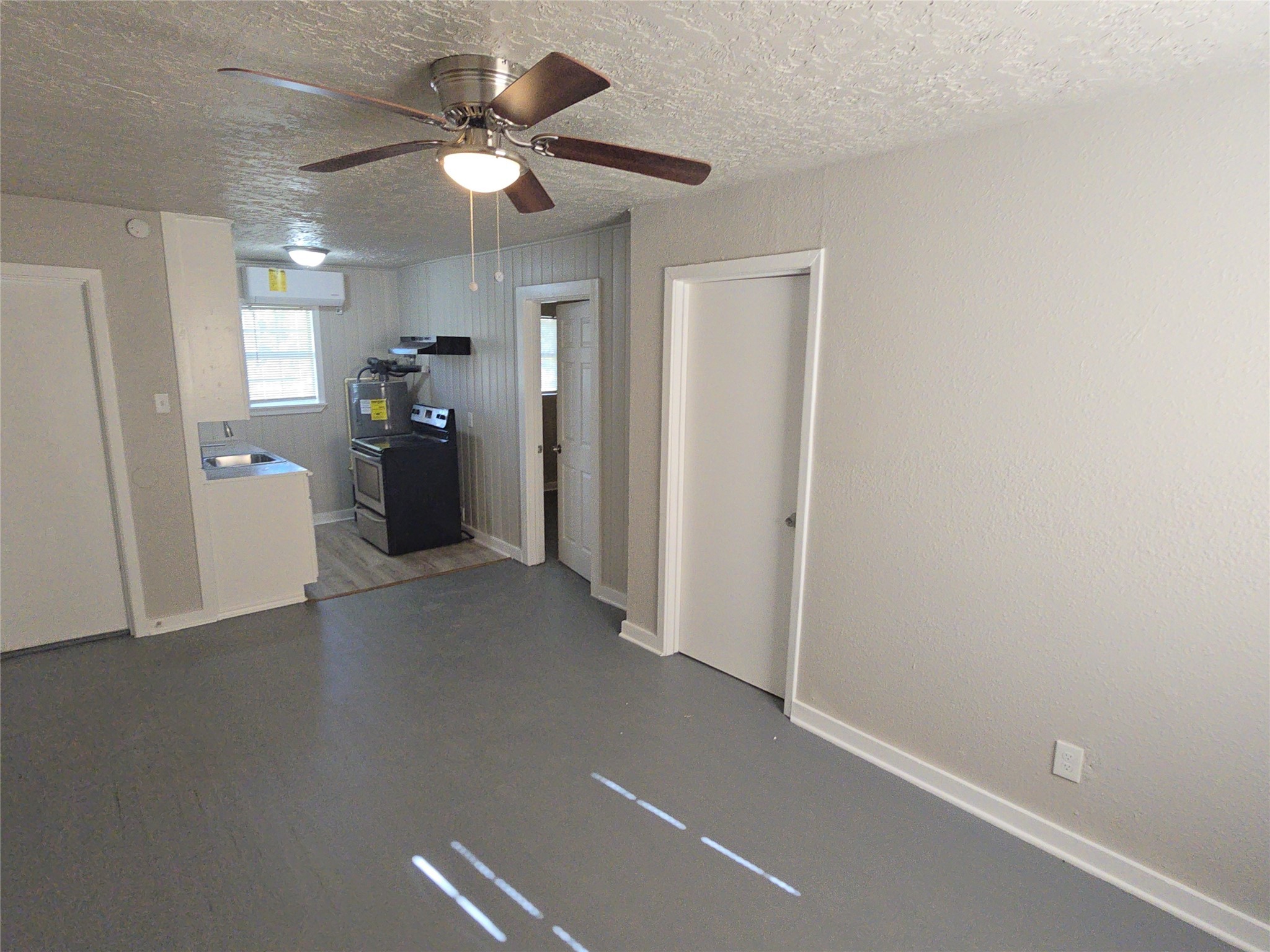 3335 Tuam Street, Unit 3 Houston, TX 77004 - Photo 1 of 16 a view of an empty room with a ceiling fan
