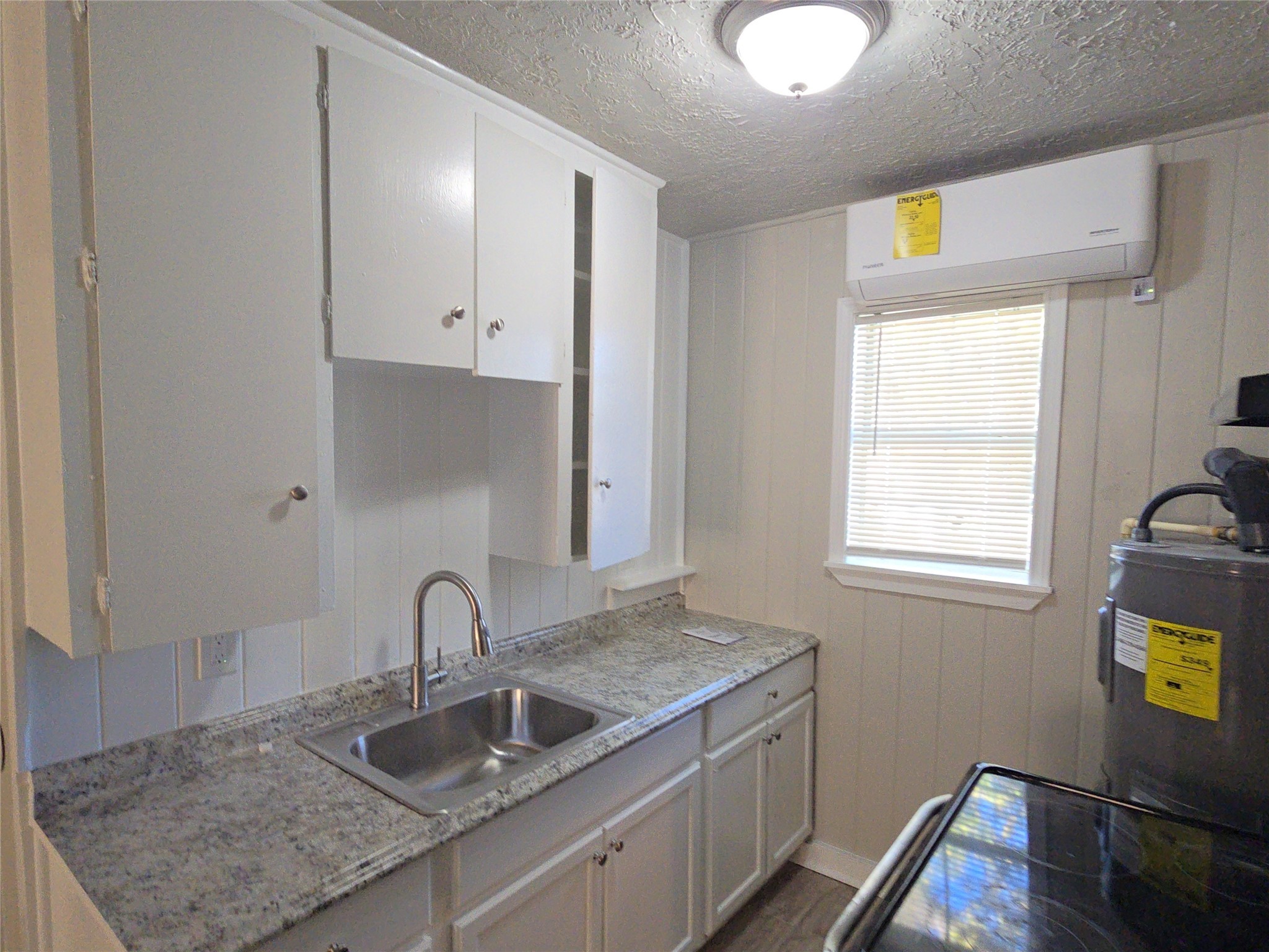 3335 Tuam Street, Unit 3 Houston, TX 77004 - Photo 11 of 16 a kitchen with sink and window