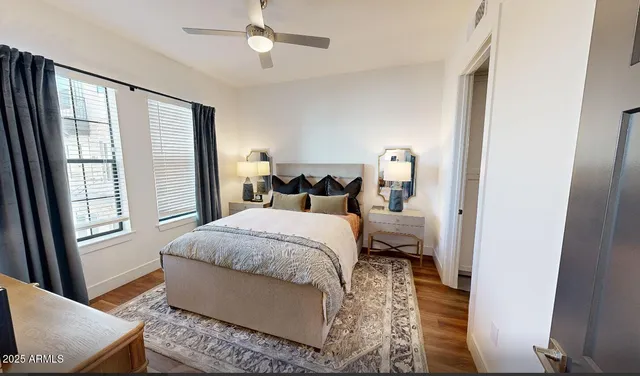 a bedroom with a bed and window