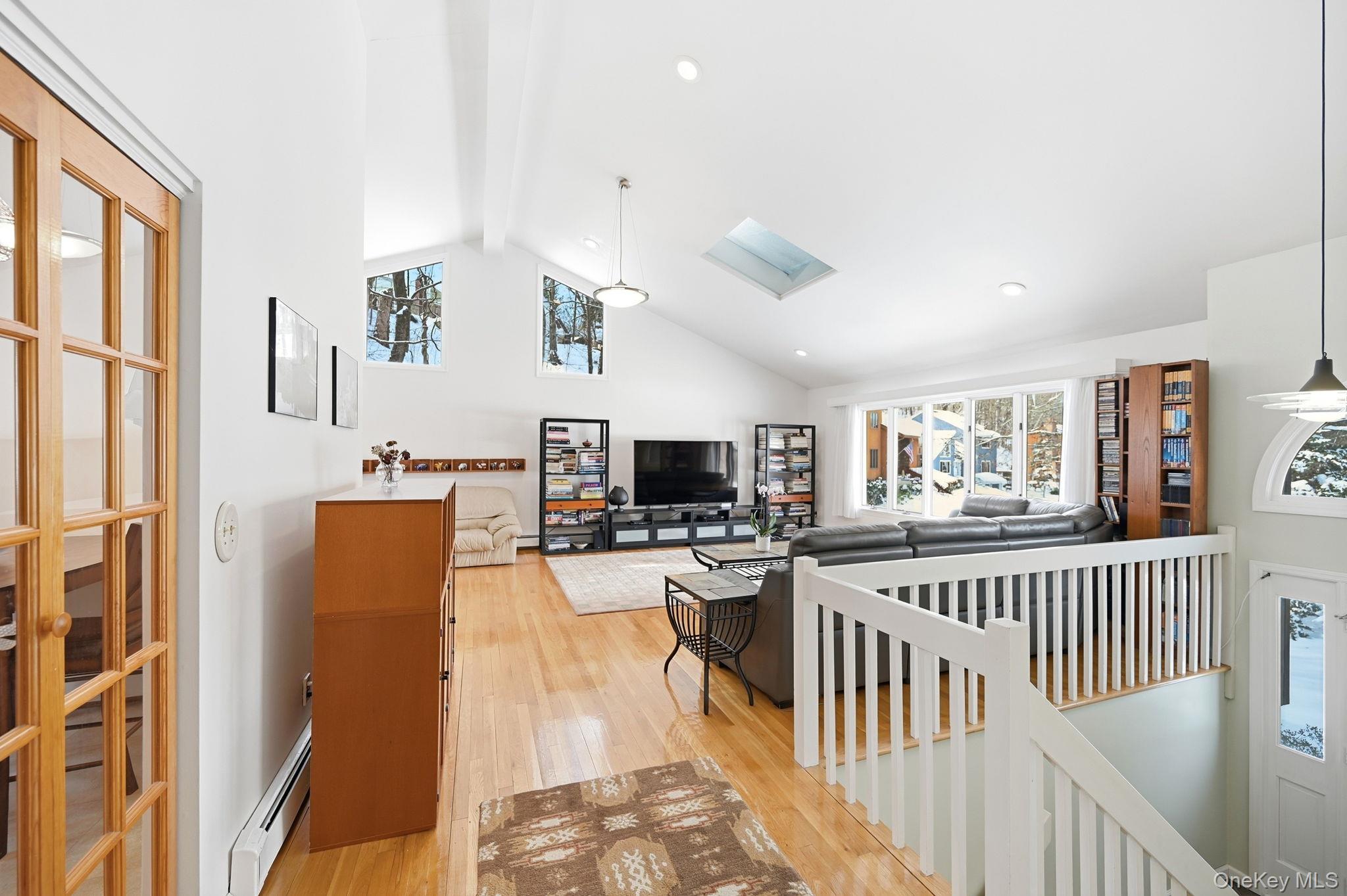 10 Pine Brook Road Ossining, NY 10562 - Photo 17 of 48 a living room with furniture and a flat screen tv