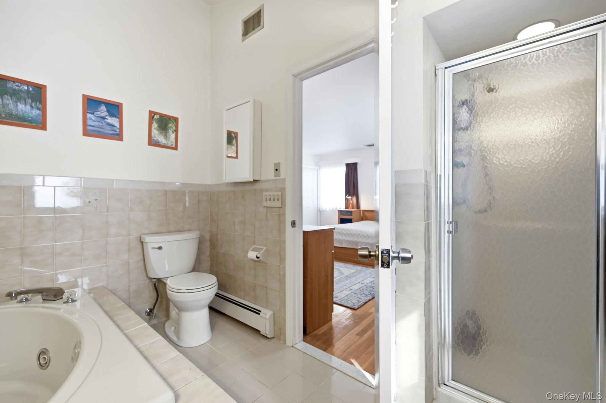 10 Pine Brook Road Ossining, NY 10562 - Photo 21 of 48 a bathroom with a toilet sink and shower