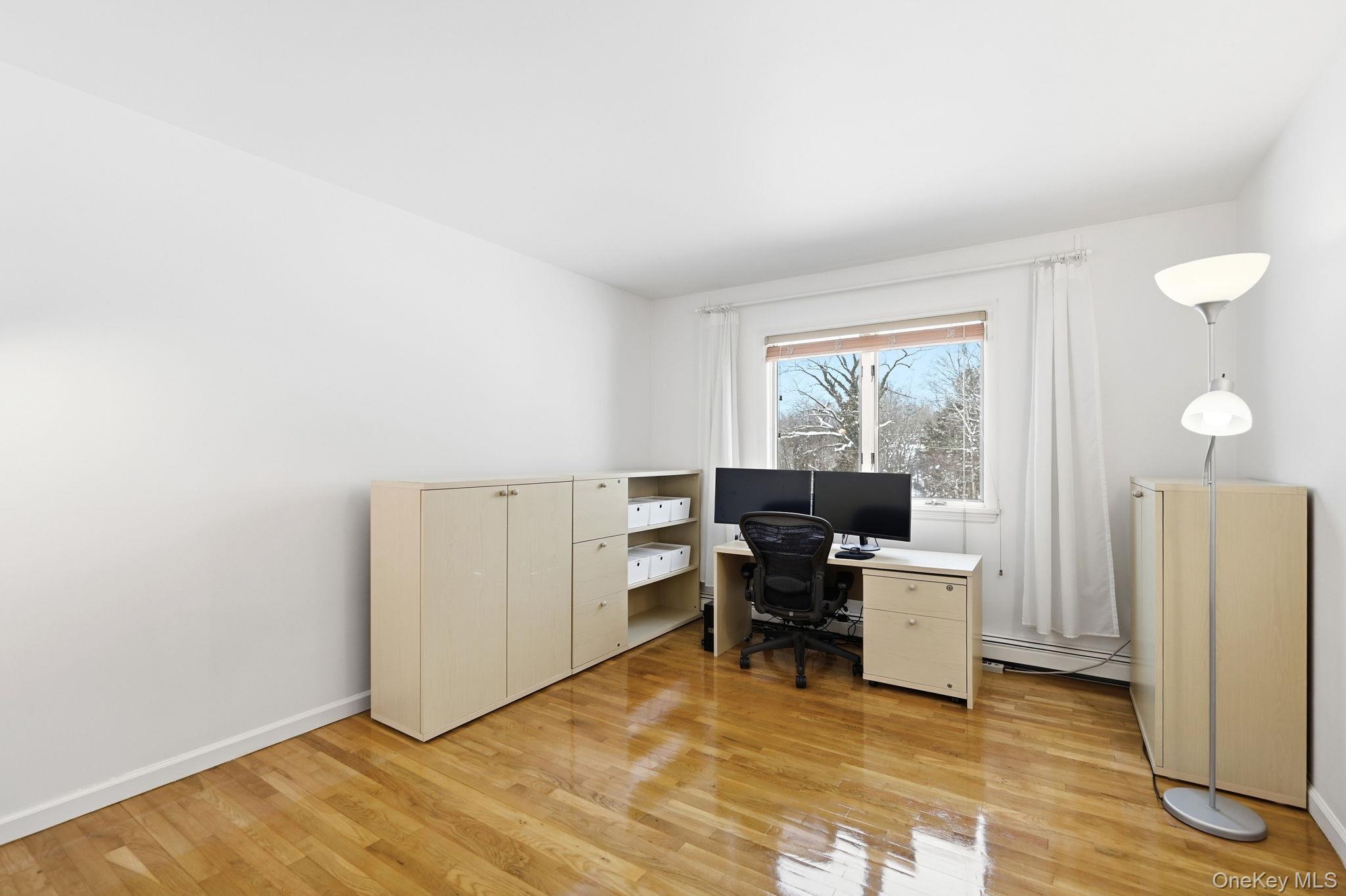 10 Pine Brook Road Ossining, NY 10562 - Photo 29 of 48 a view of a workspace with furniture and a window