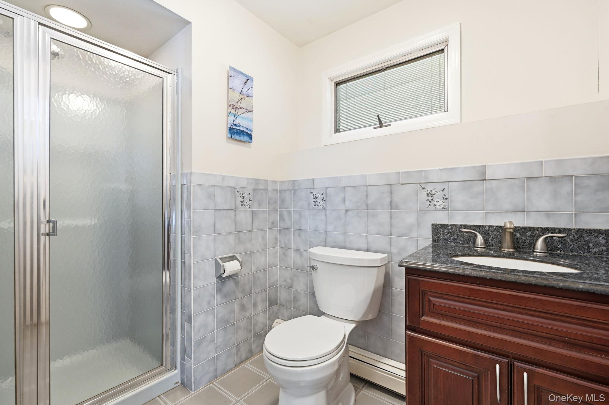 10 Pine Brook Road Ossining, NY 10562 - Photo 31 of 48 a bathroom with a toilet and a shower