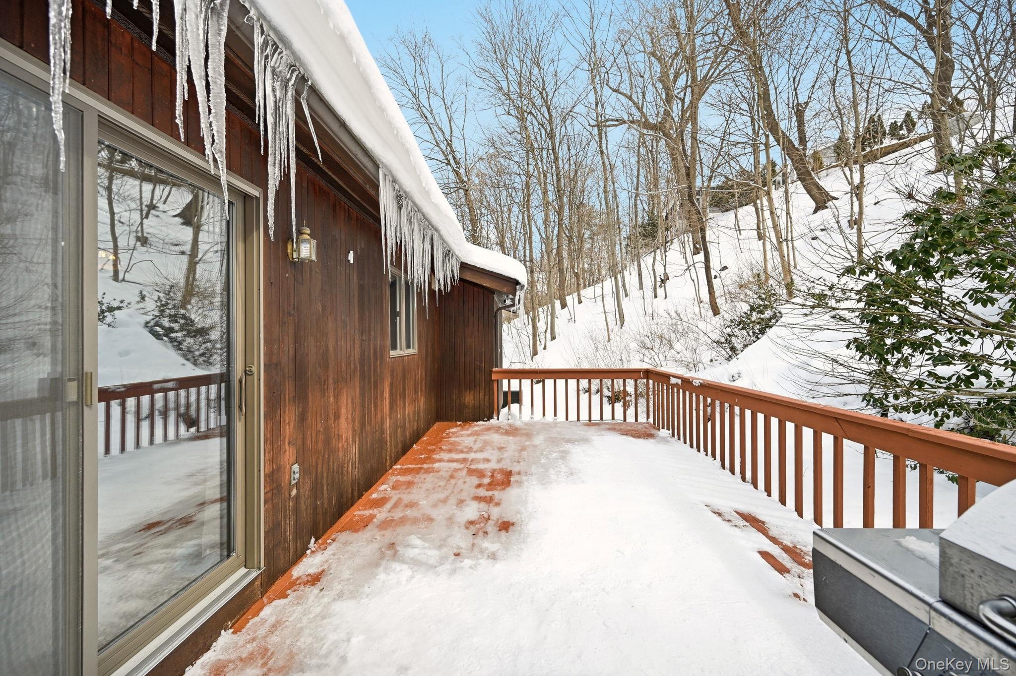 10 Pine Brook Road Ossining, NY 10562 - Photo 41 of 48 a view of a porch with wooden floor and fence