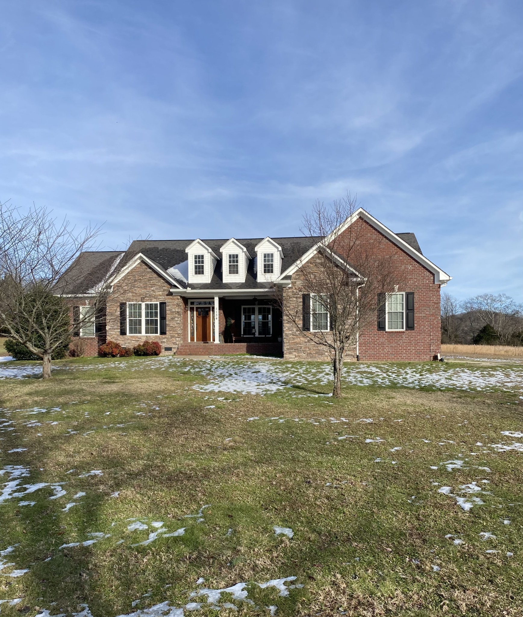 1134 John Sharp Road Spring Hill, TN 37174 - Photo 1 of 41 a front view of a house with a yard
