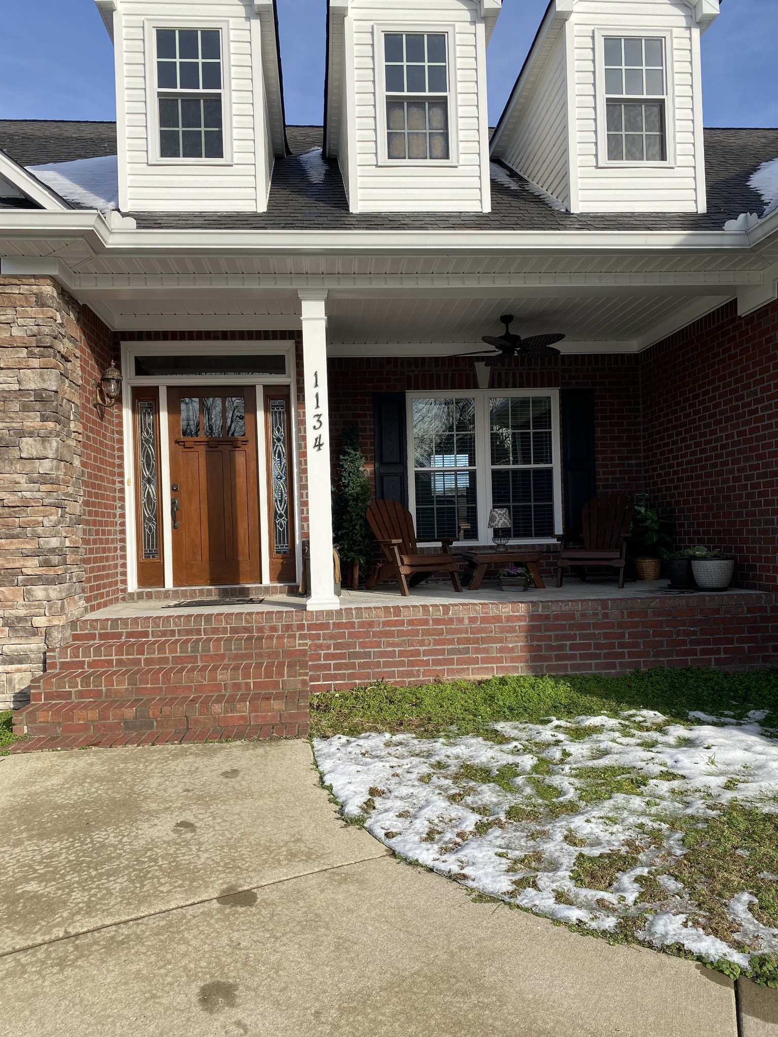 1134 John Sharp Road Spring Hill, TN 37174 - Photo 3 of 41 a view of a brick building with a large windows
